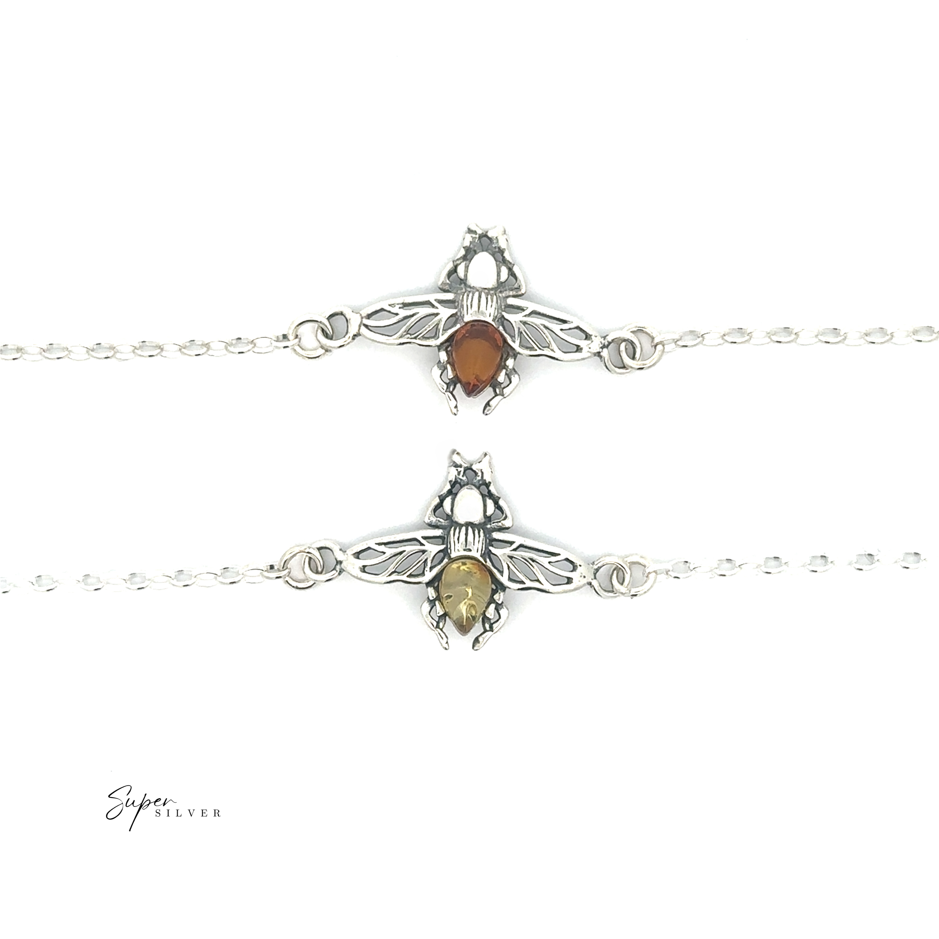 Two Baltic Amber Bee Bracelets, crafted in sterling silver with bee shapes and genuine Baltic amber bodies—one orange, one yellow—are displayed on a white background, showcasing their vibrant natural beauty.