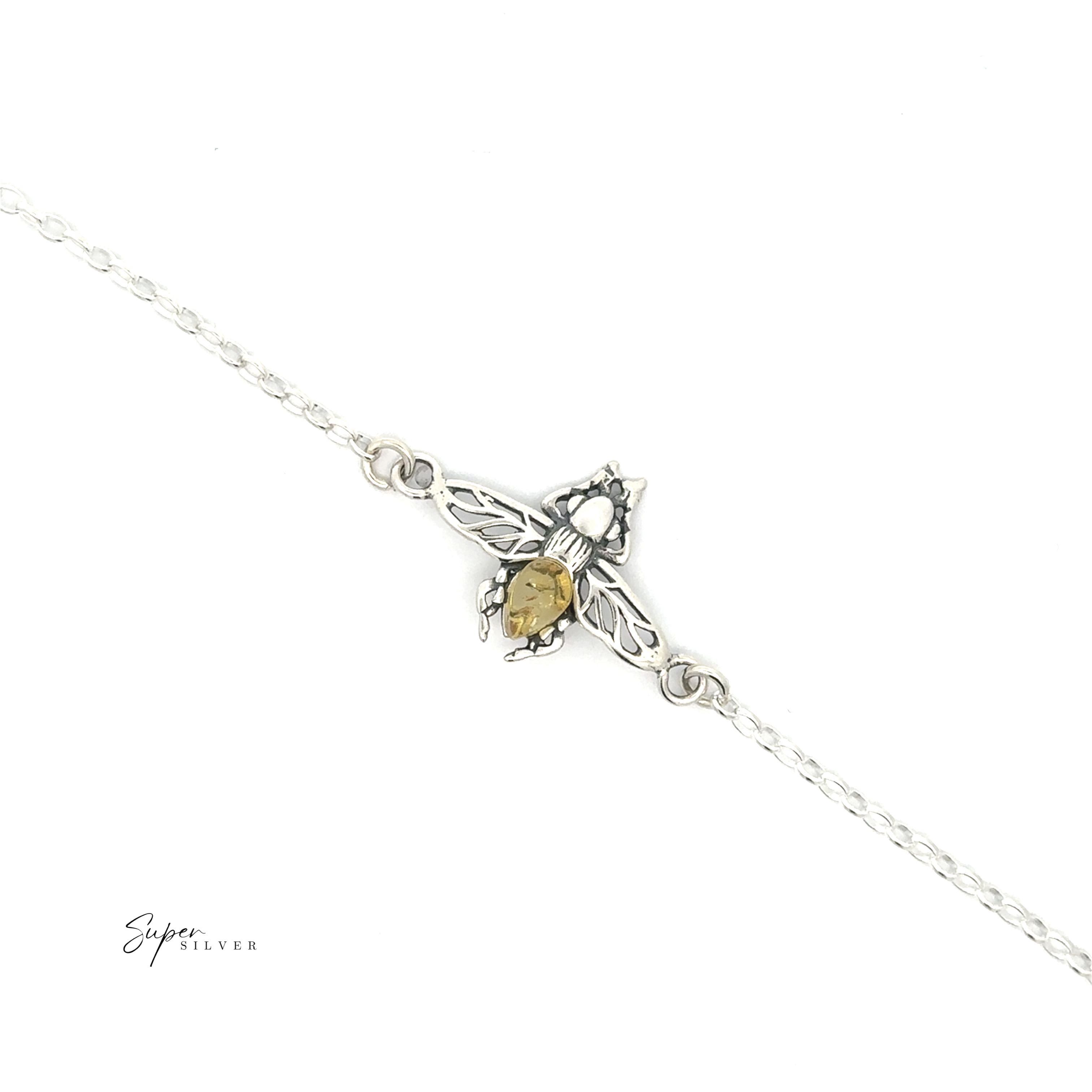 The Baltic Amber Bee Bracelet is a sterling silver chain with a detailed bee charm featuring a genuine Baltic amber gemstone, shown on a white background.