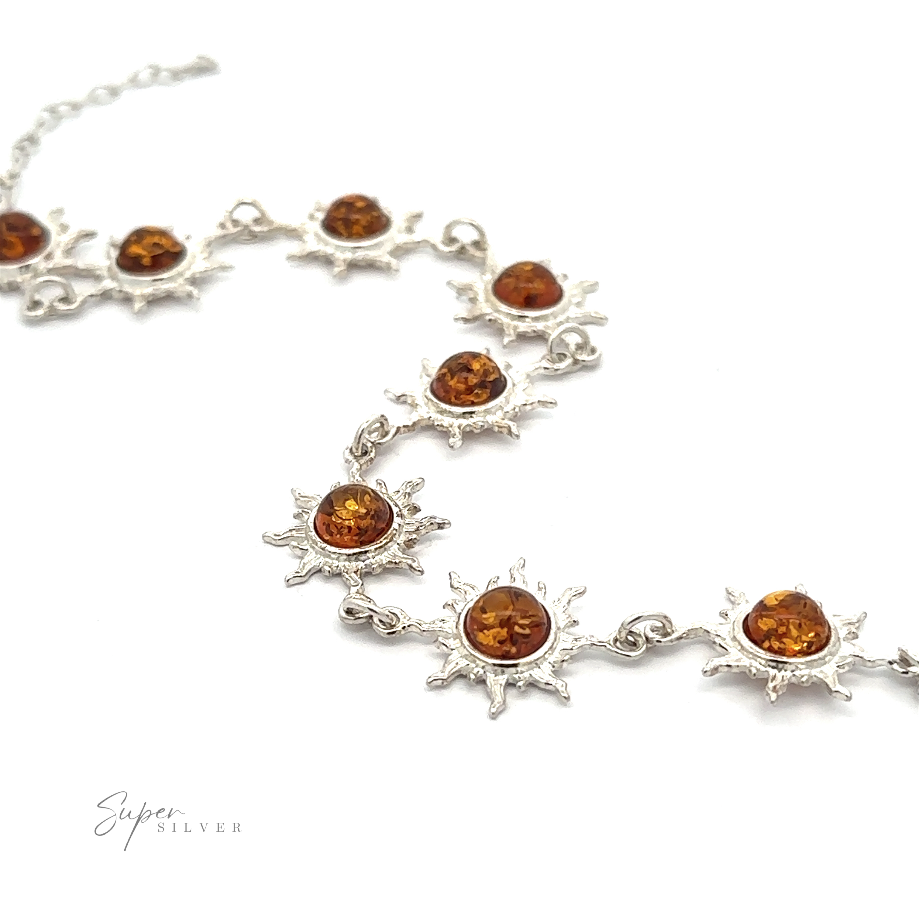 A sterling silver bracelet featuring sun-shaped designs with amber-like stones in the center, displayed on a white background. The brand name "Super Silver" is visible in the bottom left corner, showcasing this exquisite piece of Sparkling Amber Sun Bracelet craftsmanship.