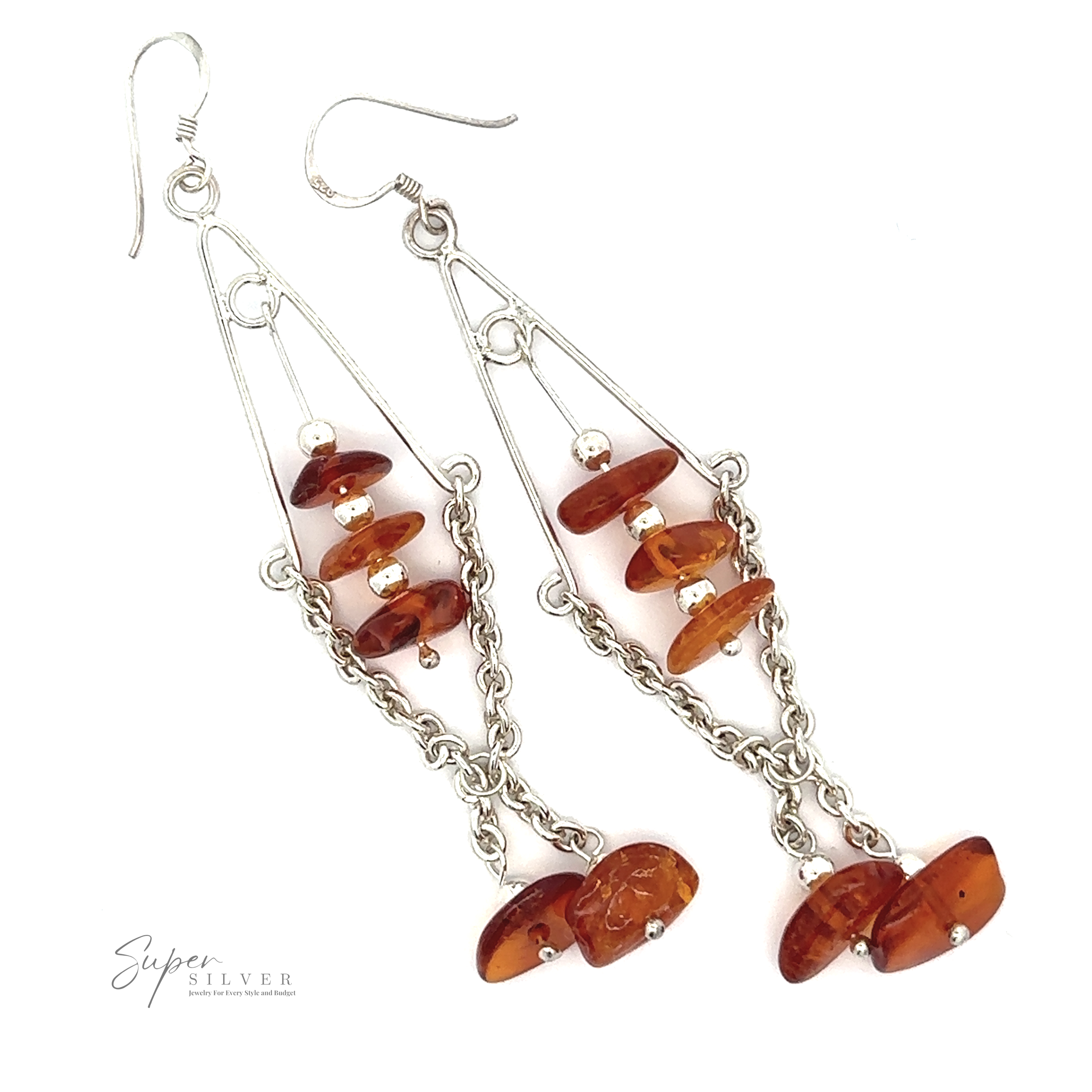 A pair of Beaded Amber Tassel Earrings with dangling orange gemstones and a chain link design exuding festival fashion. The earrings feature a curved wire hook and are displayed on a white background, with the Super Silver logo visible.