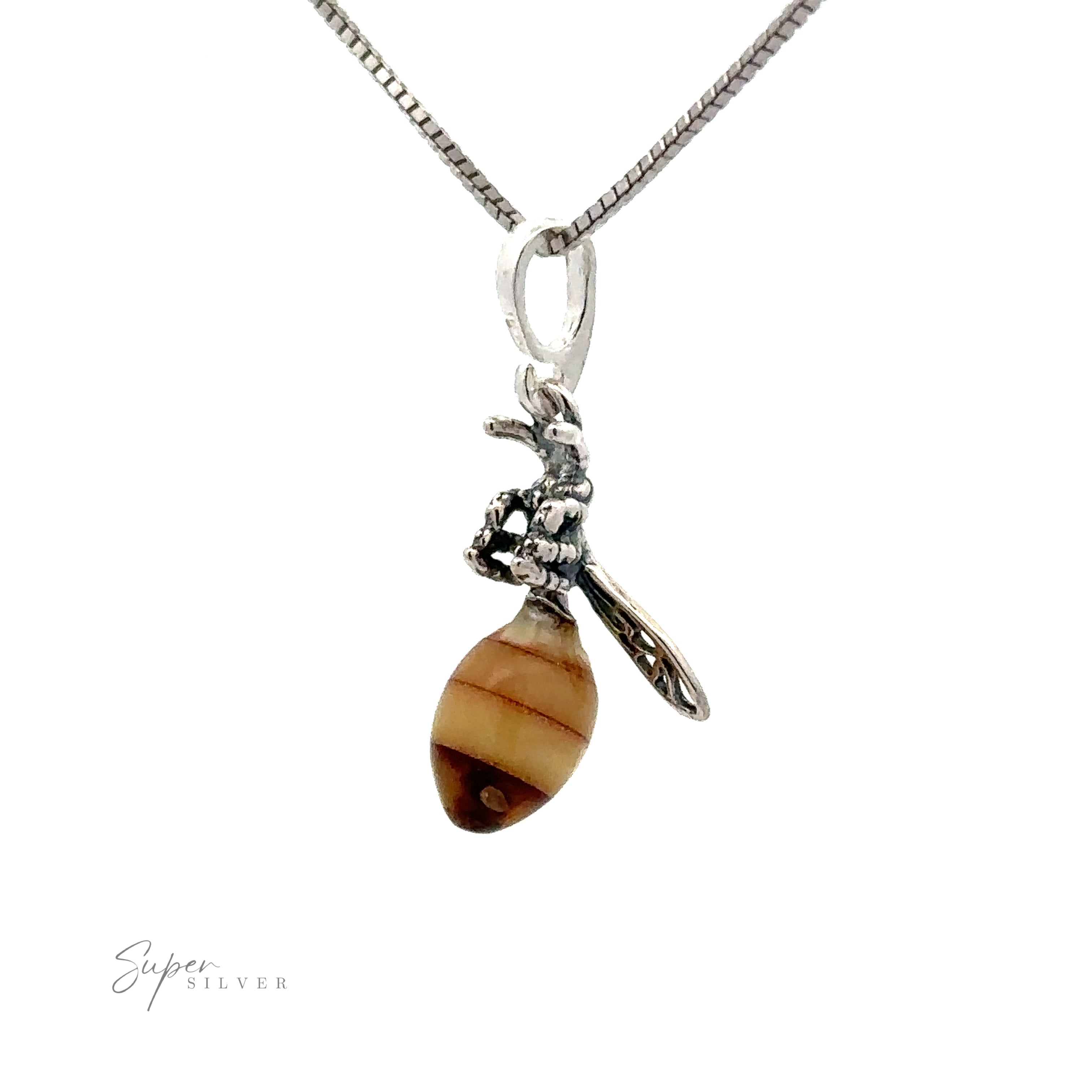 A Beautiful Amber Yellow Jacket Pendant shaped like an insect, clutching a striped brown and beige bead.