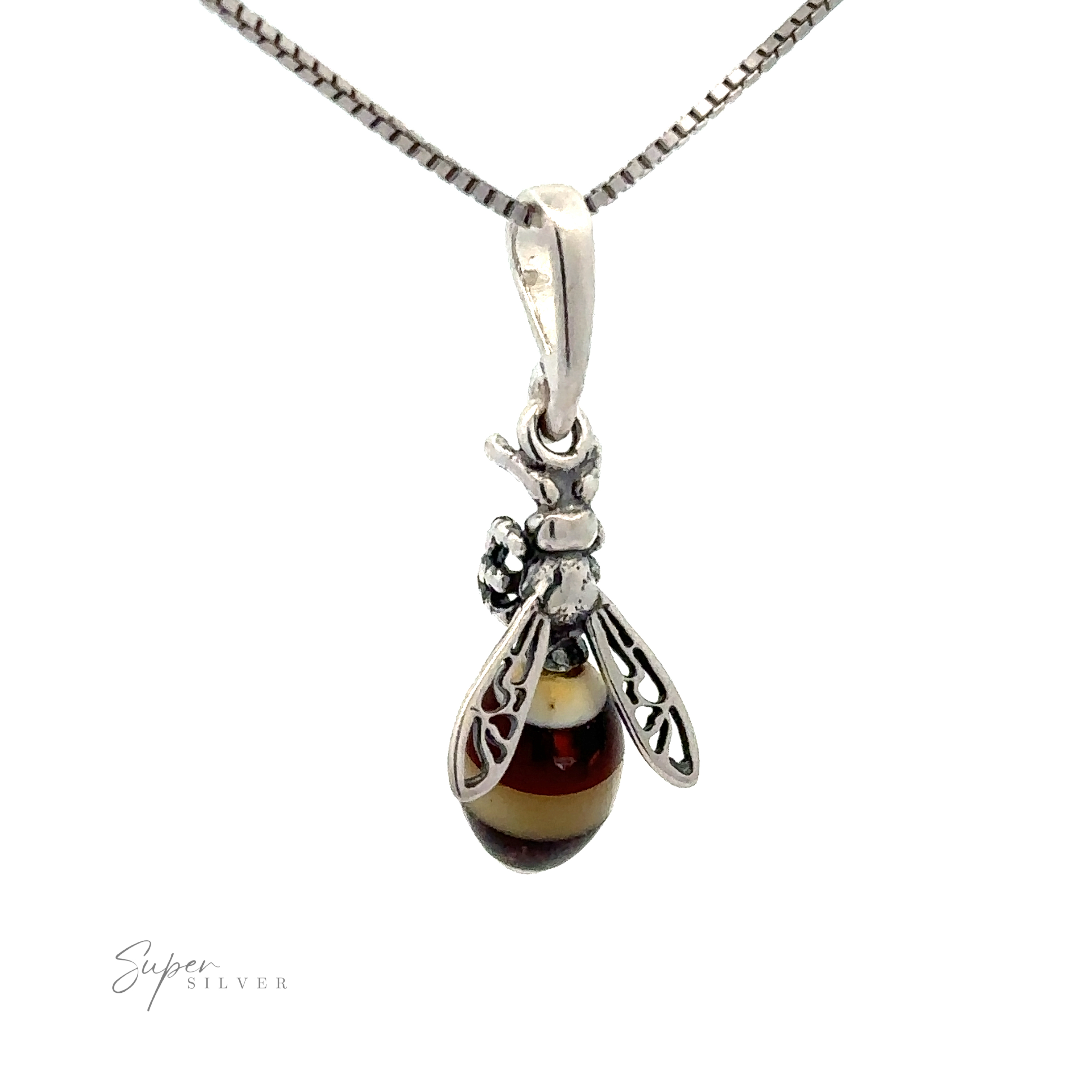A sterling silver jewelry piece, this Beautiful Amber Yellow Jacket Pendant in the shape of a bee with a striped body hangs from a chain, displayed against a white background. The amber pendant features intricate detailing on the wings and body, adding elegance to its design.