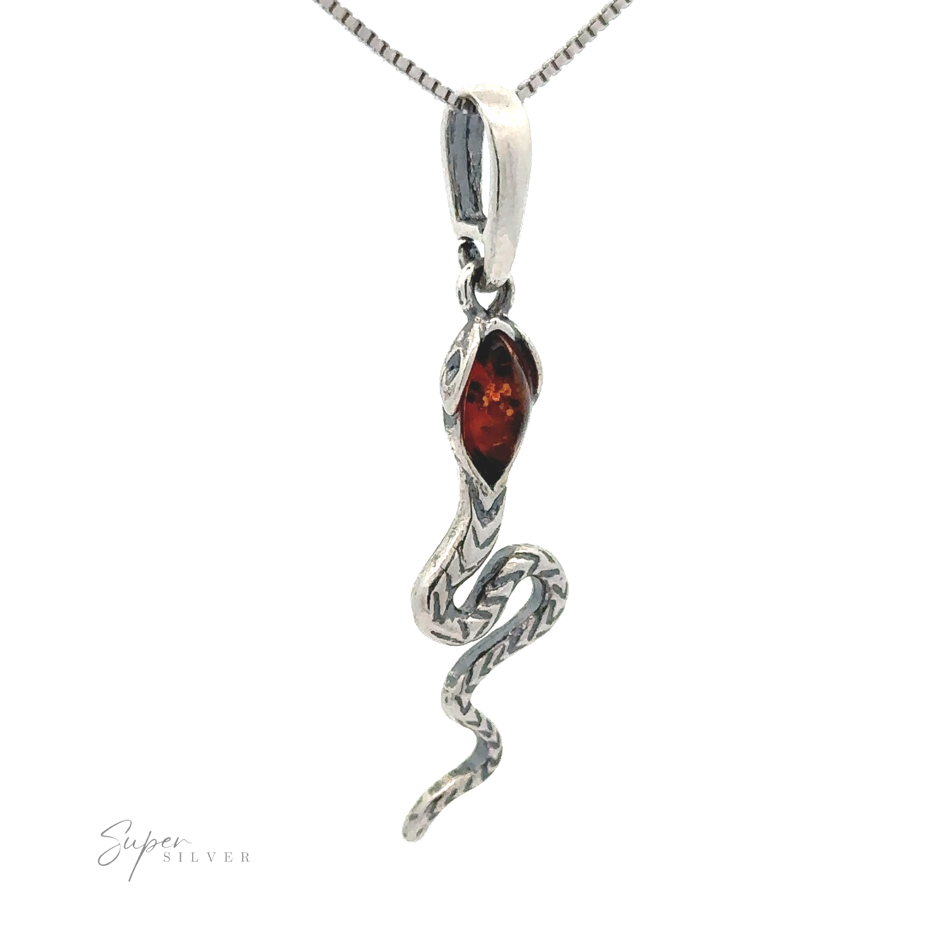 An Alluring Amber Snake Pendant with a red gemstone in its head, hanging from a chain, exudes a vintage vibe.