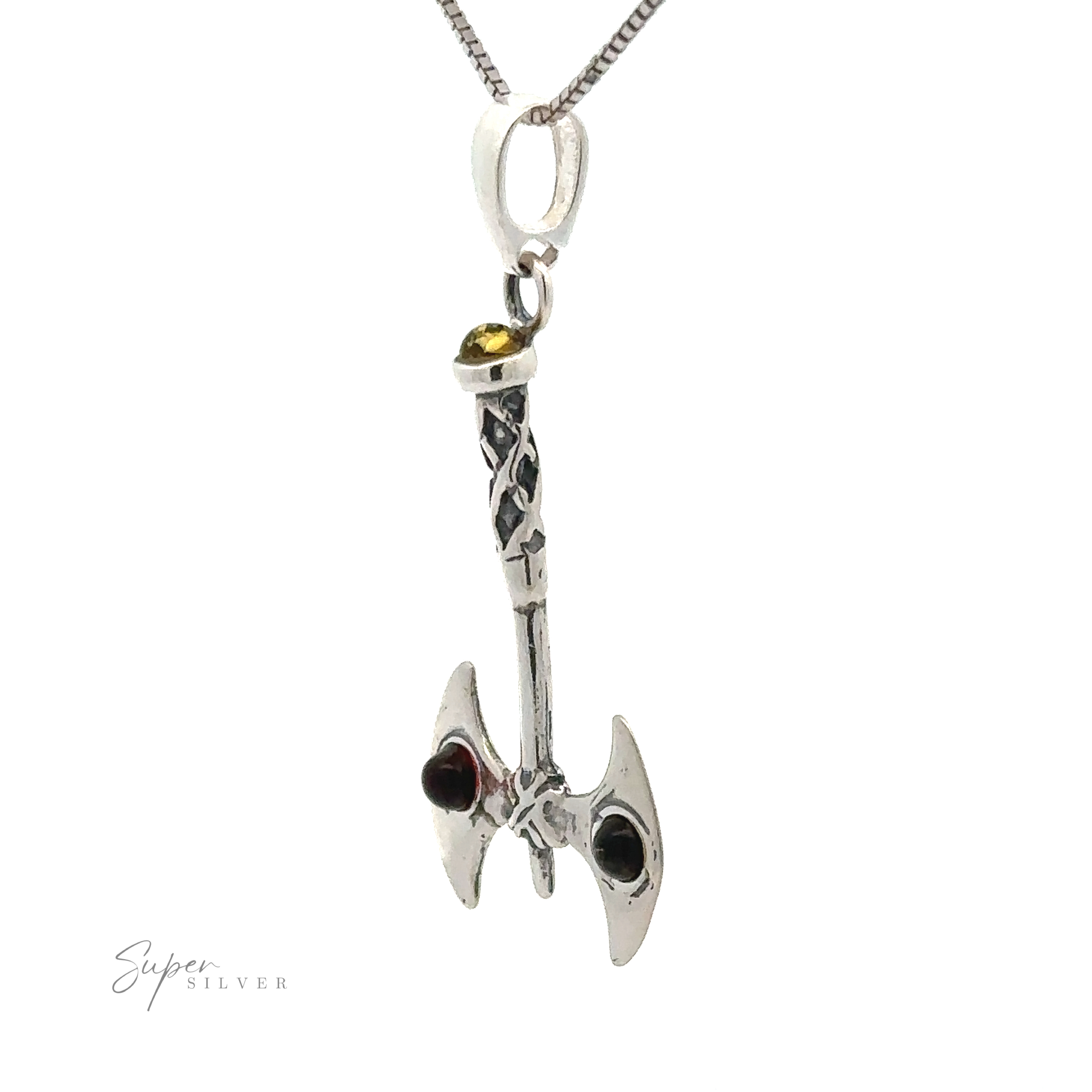 A silver necklace featuring an Amber Accented Battle Axe Pendant adorned with small yellow and dark red stones. The pendant hangs from a thin chain, exuding the spirit of warrior courage.