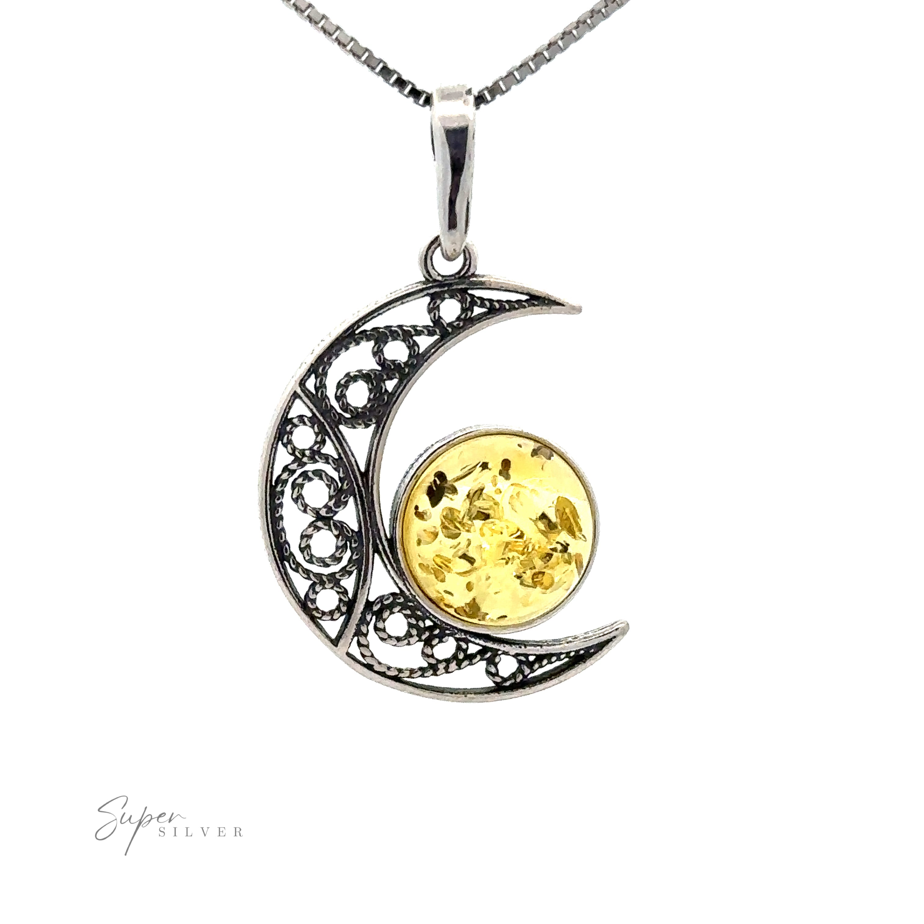 A Baltic Amber Moon Pendant with intricate designs features a round, Baltic amber gemstone in the center, hanging elegantly on a silver chain. The text "Super Silver" is visible in the bottom left corner.