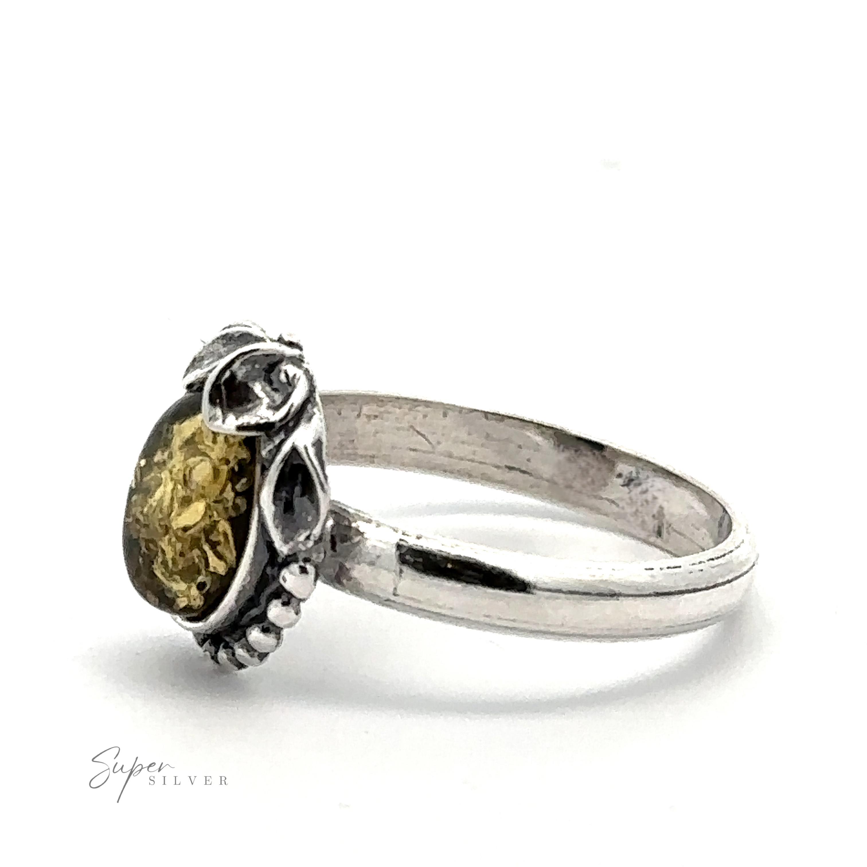 Amber Ring with Beaded Border and Peace Lily Details featuring a yellow gemstone at its center, exuding vintage elegance and nature-inspired beauty.