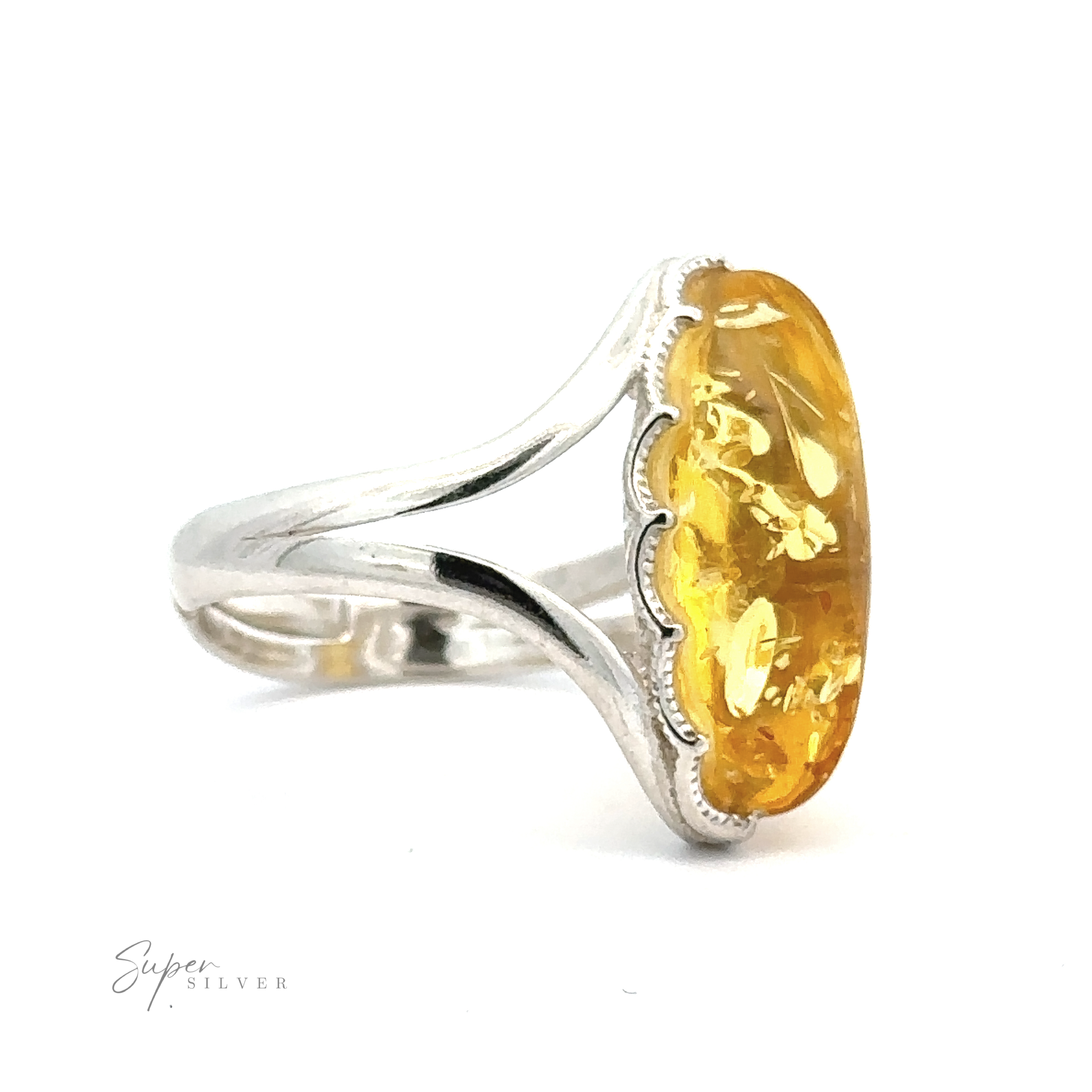 Close-up of a Marquise-Shaped Baltic Amber Adjustable Ring featuring a yellow gemstone. The adjustable band splits into two as it nears the stone, which has a slightly textured surface.