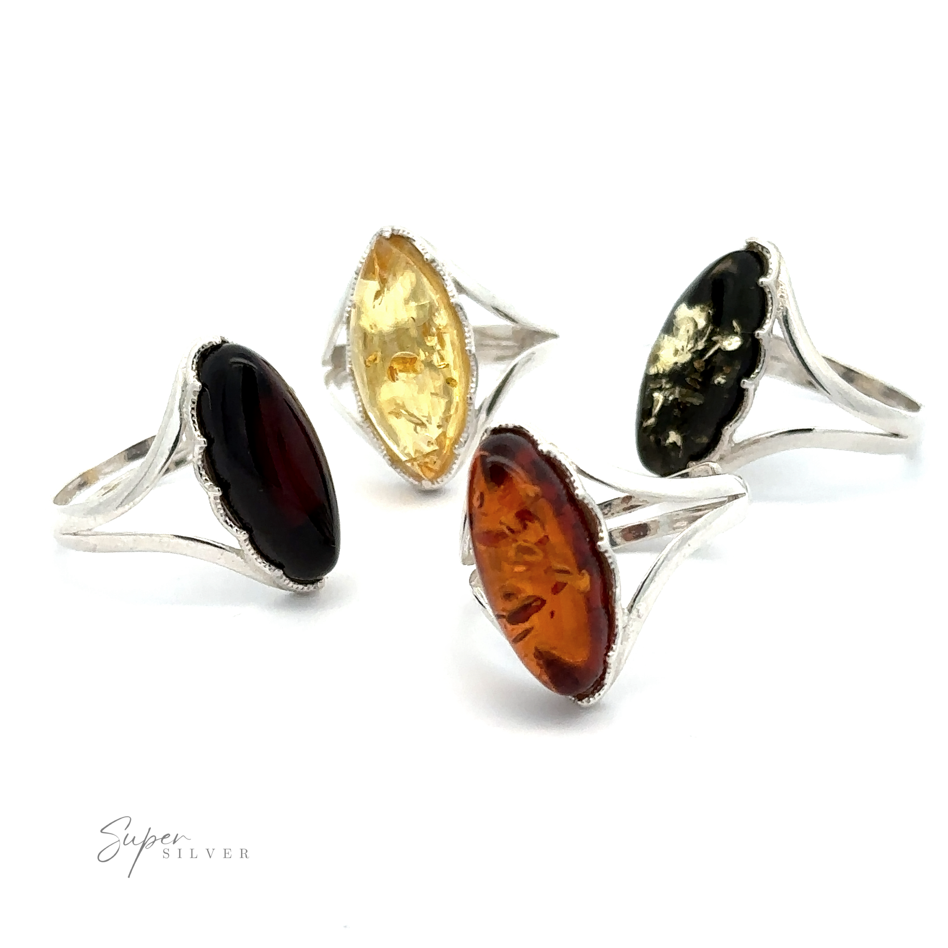 Four silver rings, each featuring an oval-shaped gemstone in various colors: dark red, yellow, orange, and black. One ring highlights a Marquise-Shaped Baltic Amber Adjustable Ring. The rings, complemented by adjustable bands for comfort, are arranged in a semi-circle on a white background.