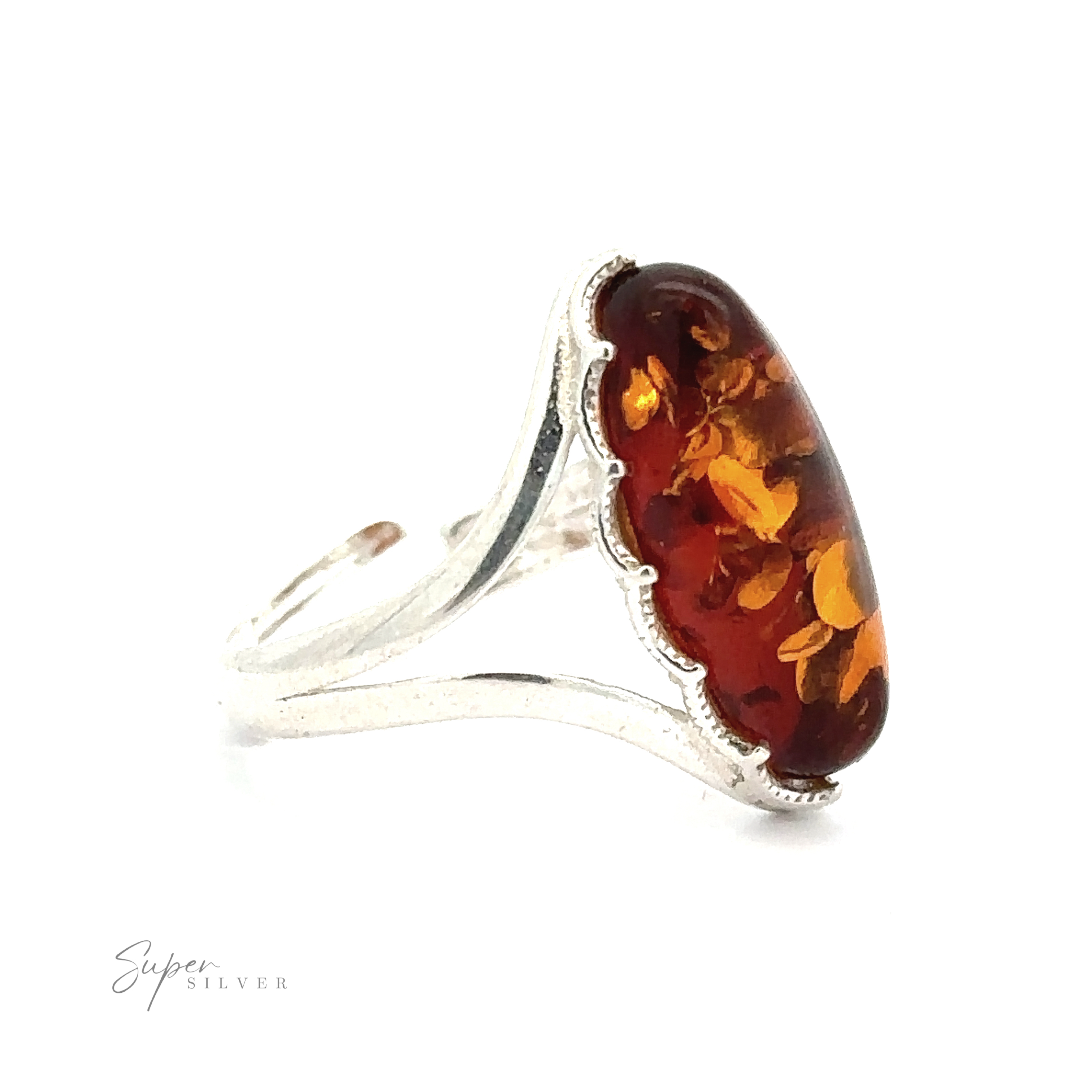 A Marquise-Shaped Baltic Amber Adjustable Ring featuring a decorative setting and an adjustable band.