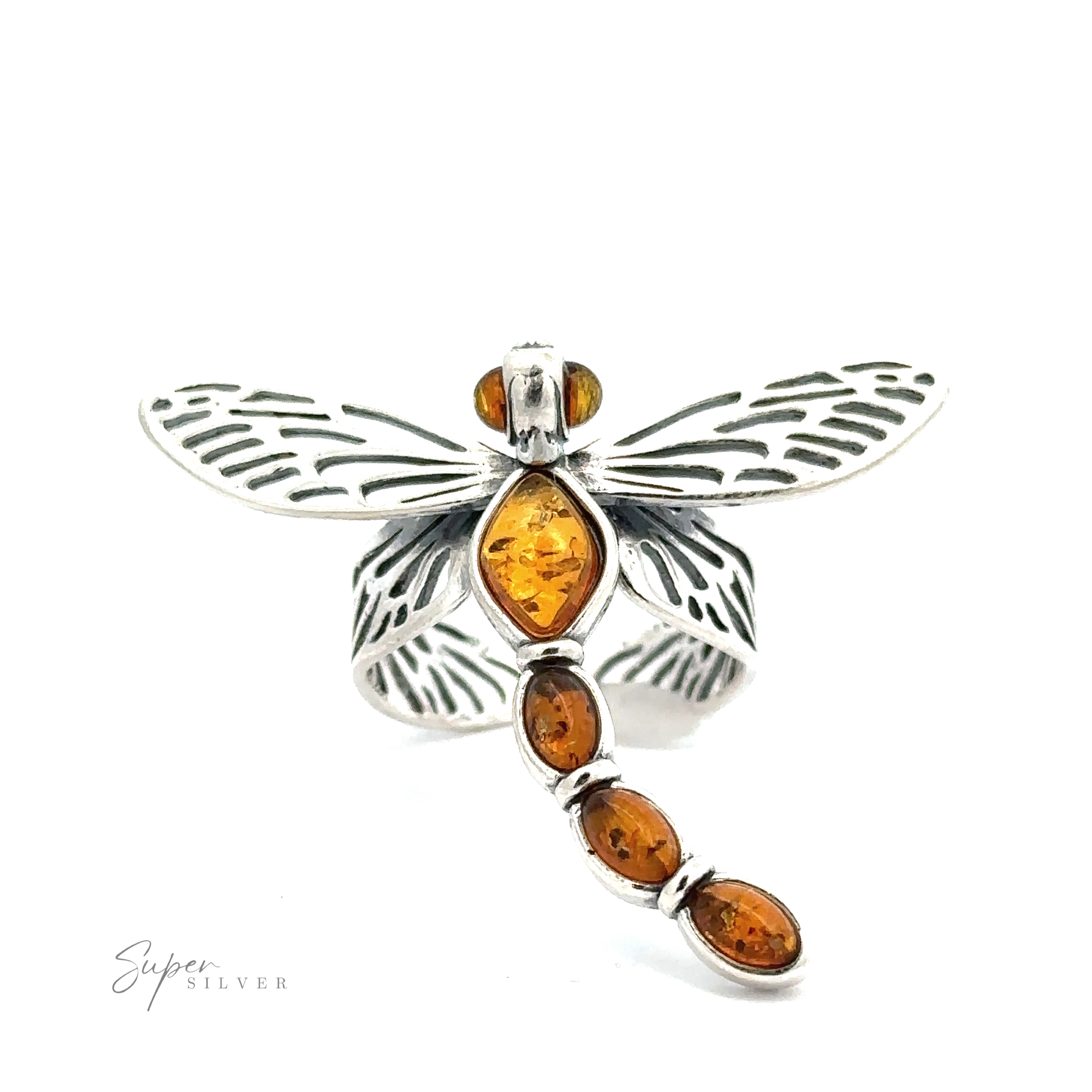 The Amber Dragonfly Adjustable Ring is a stunning piece of nature-inspired jewelry, shaped like a dragonfly and featuring five cognac amber stones along its body and wings.