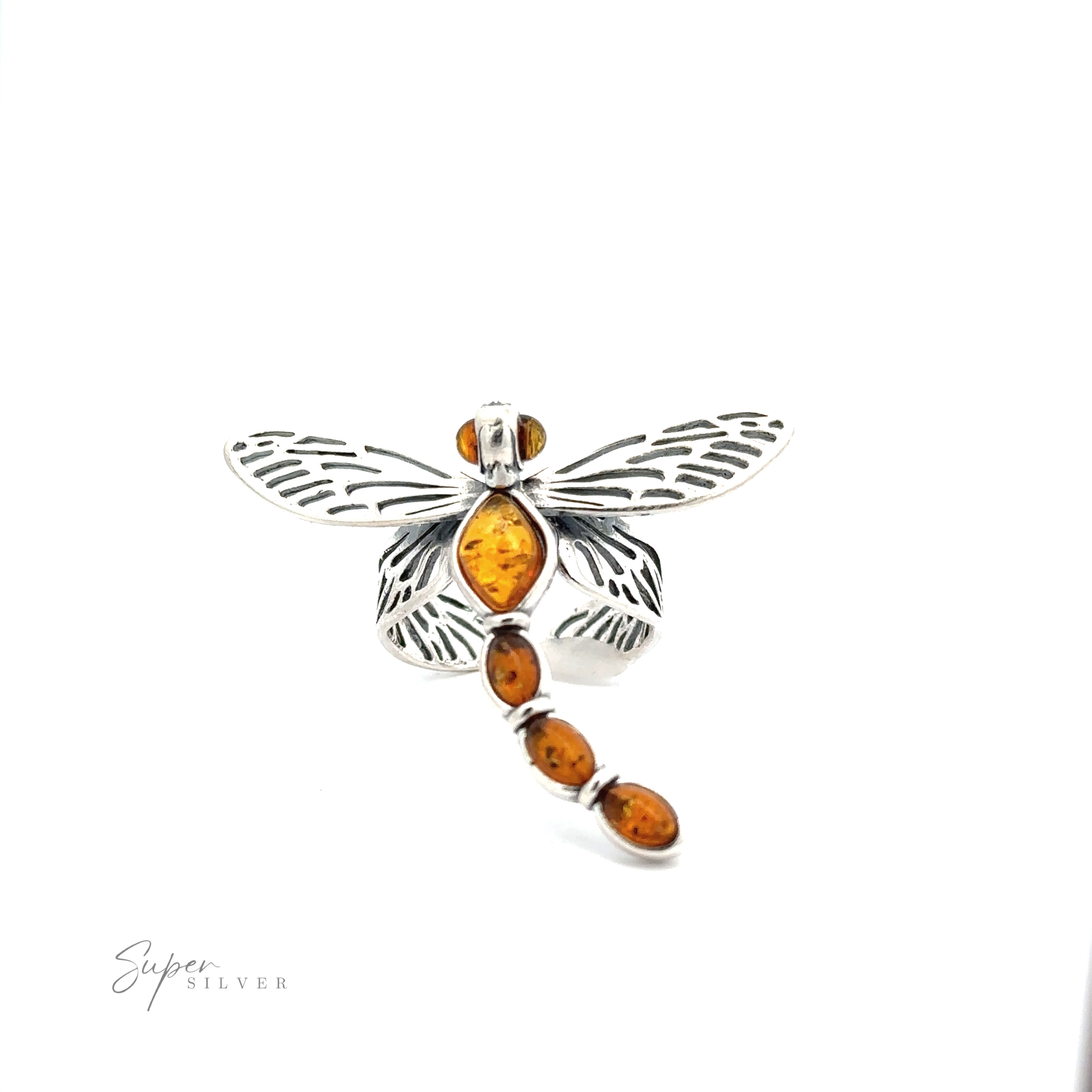 The Amber Dragonfly Adjustable Ring is a stunning piece of nature-inspired jewelry, crafted in silver and adorned with cognac amber stones on its body and wings.