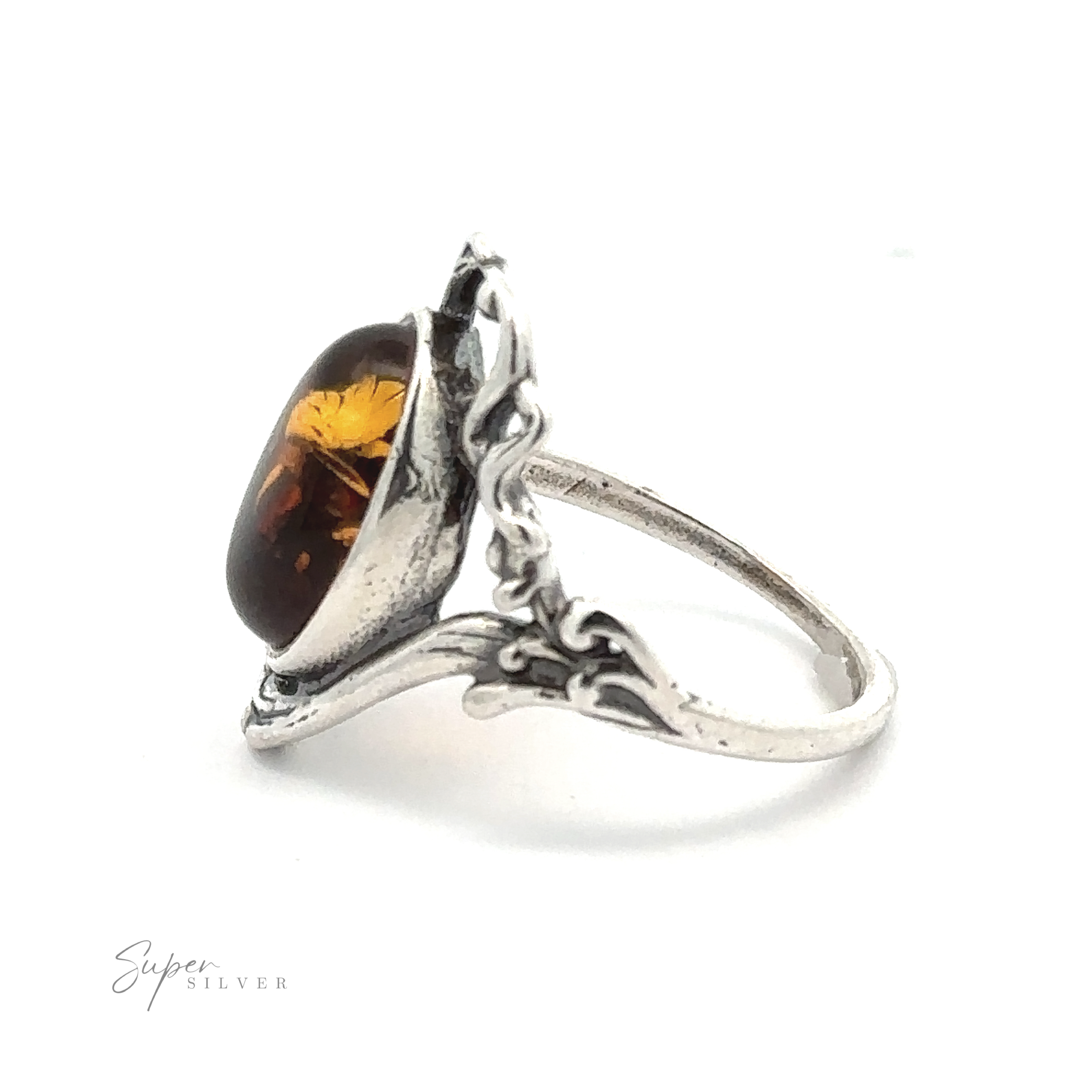 Amber Ring with Vine Detailing with an intricate band design and antique allure, featuring a polished amber gemstone, displayed against a white background. Text reads "Super Silver.