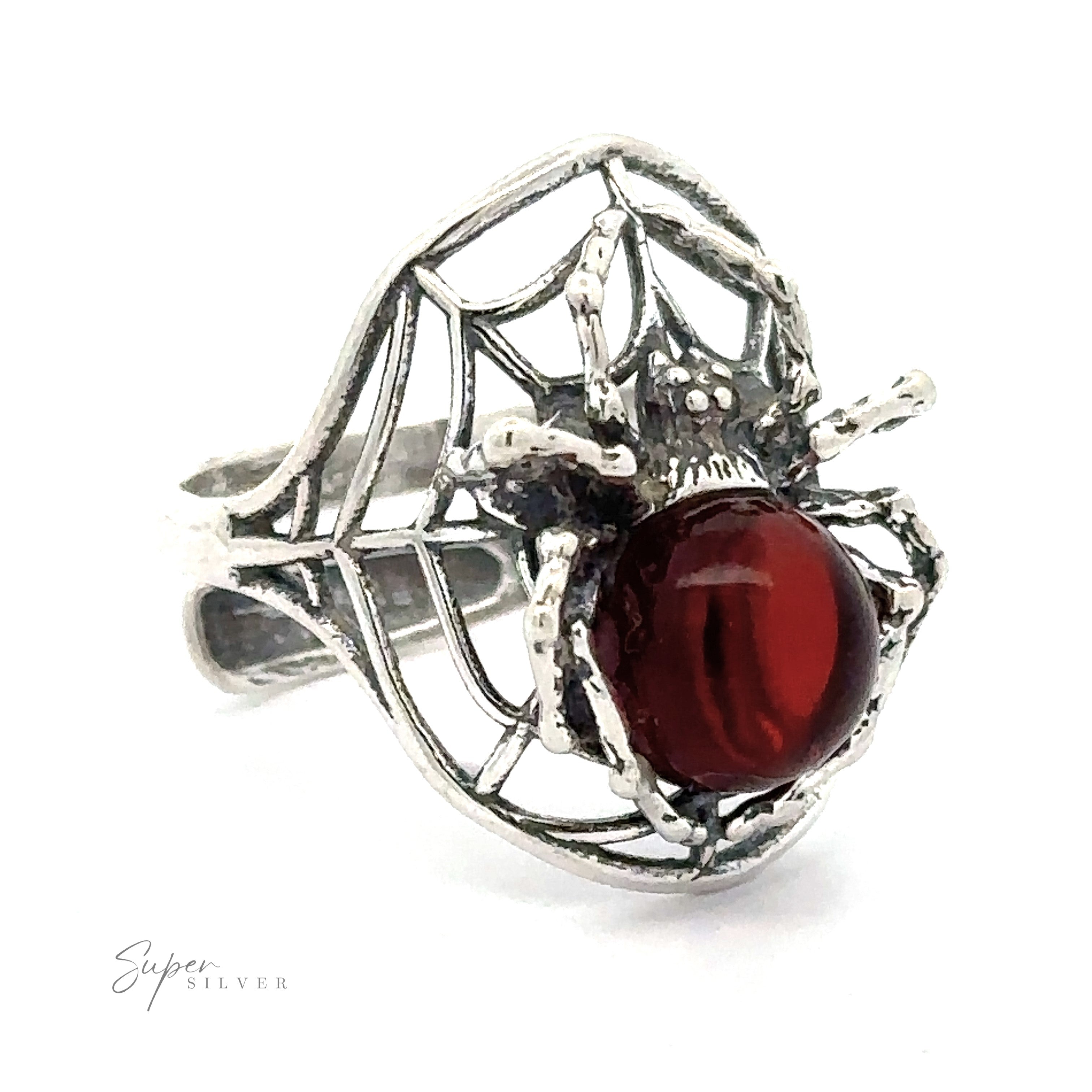 Entrancing Adjustable Baltic Amber Spider Ring with a cognac Baltic amber body and intricate web detailing on a white background.