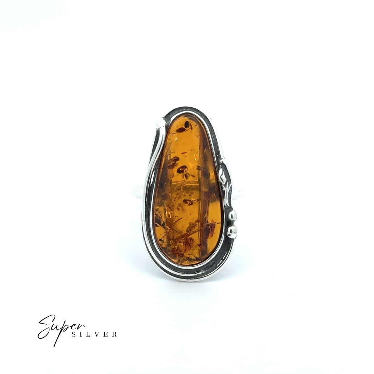 Golden Amber Adjustable Statement Ring featuring an oval Baltic amber stone set in a modern, asymmetrical bezel atop polished sterling silver, displayed on a white background. The “Super Silver” logo appears in the bottom left corner, highlighting this elegant piece that blends classic beauty with contemporary design.