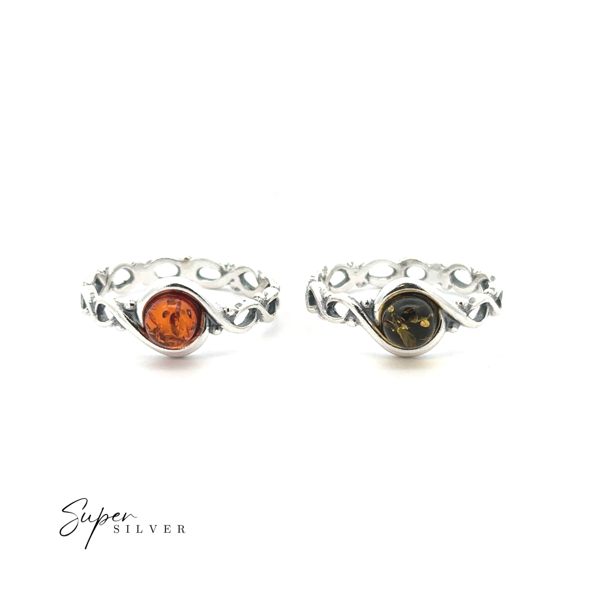Two Baltic Amber Rings with twisting sterling silver bands—one featuring a vibrant orange cognac stone and the other a greenish-brown amber—are displayed on a white background, with “Super Silver” in the corner.