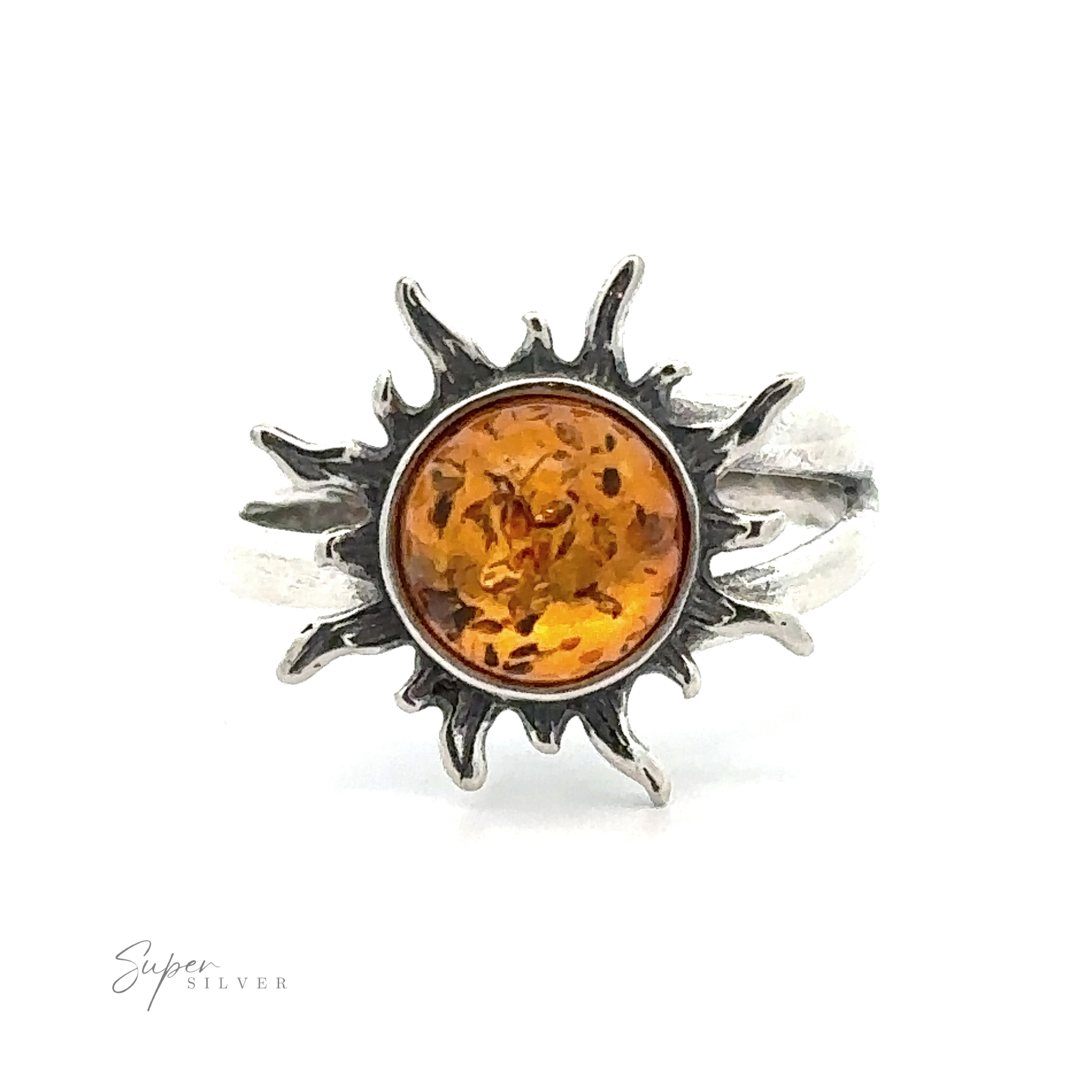 Glowing Amber Sun Ring set in a sterling silver sunburst ring on a white background.