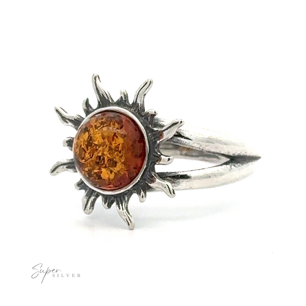 
                  
                    Sentence with product name: Glowing Amber Sun Ring with a sunburst design and a Baltic amber center, displayed against a white background.
                  
                