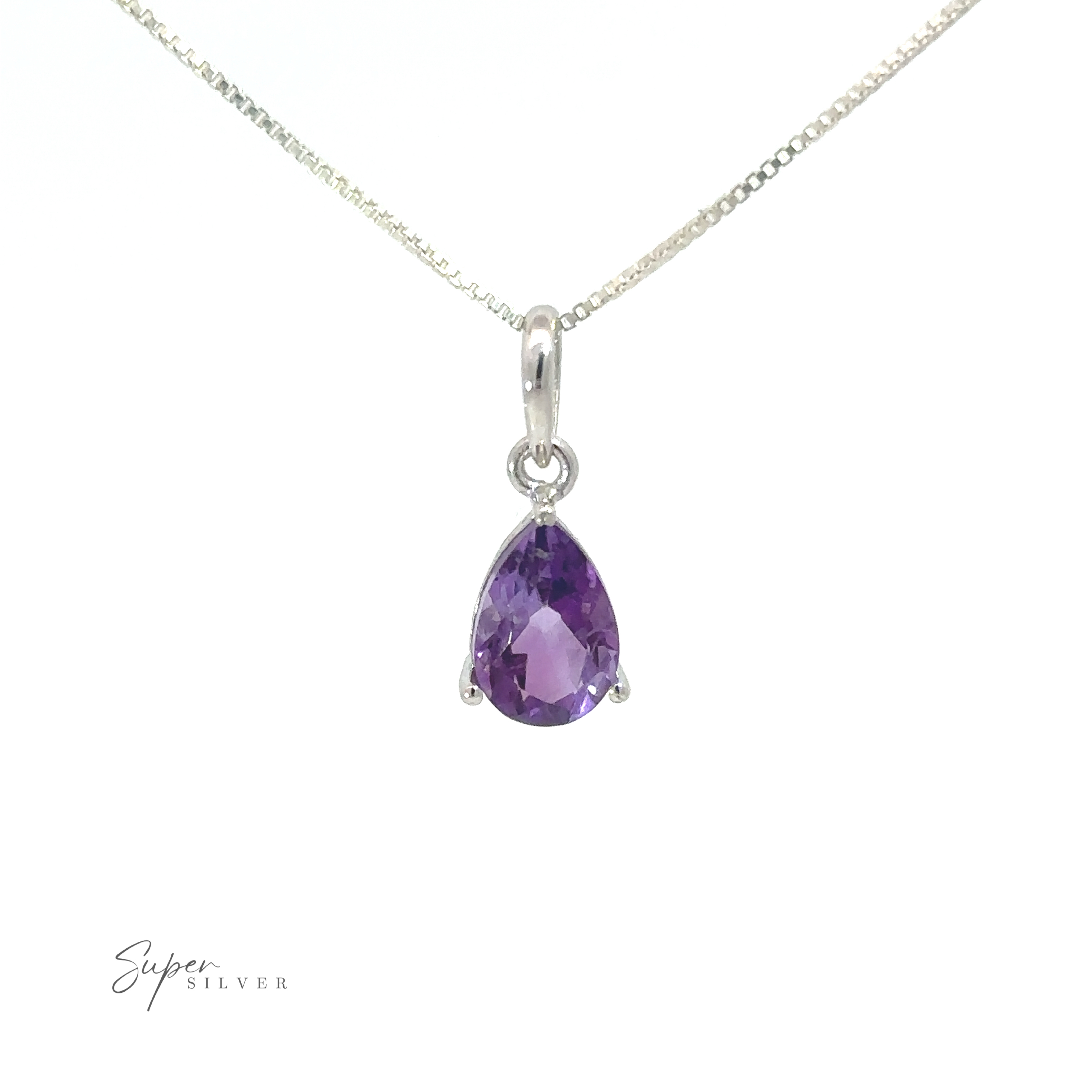 A Dainty Faceted Gemstone Pendant on a silver chain.