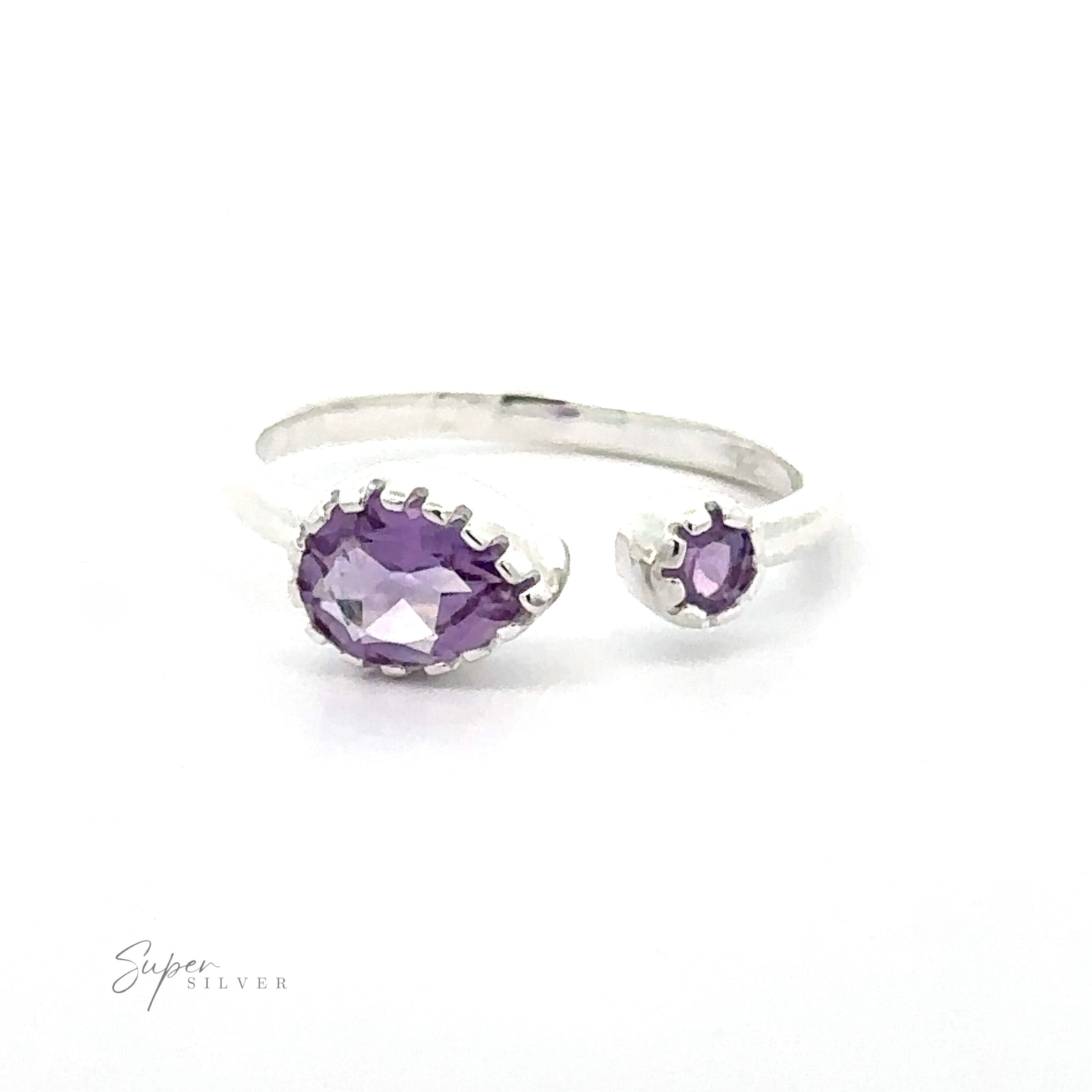 Dainty Adjustable Gemstone Ring with Two Stones with two purple gemstones, one larger than the other, set on a plain band.