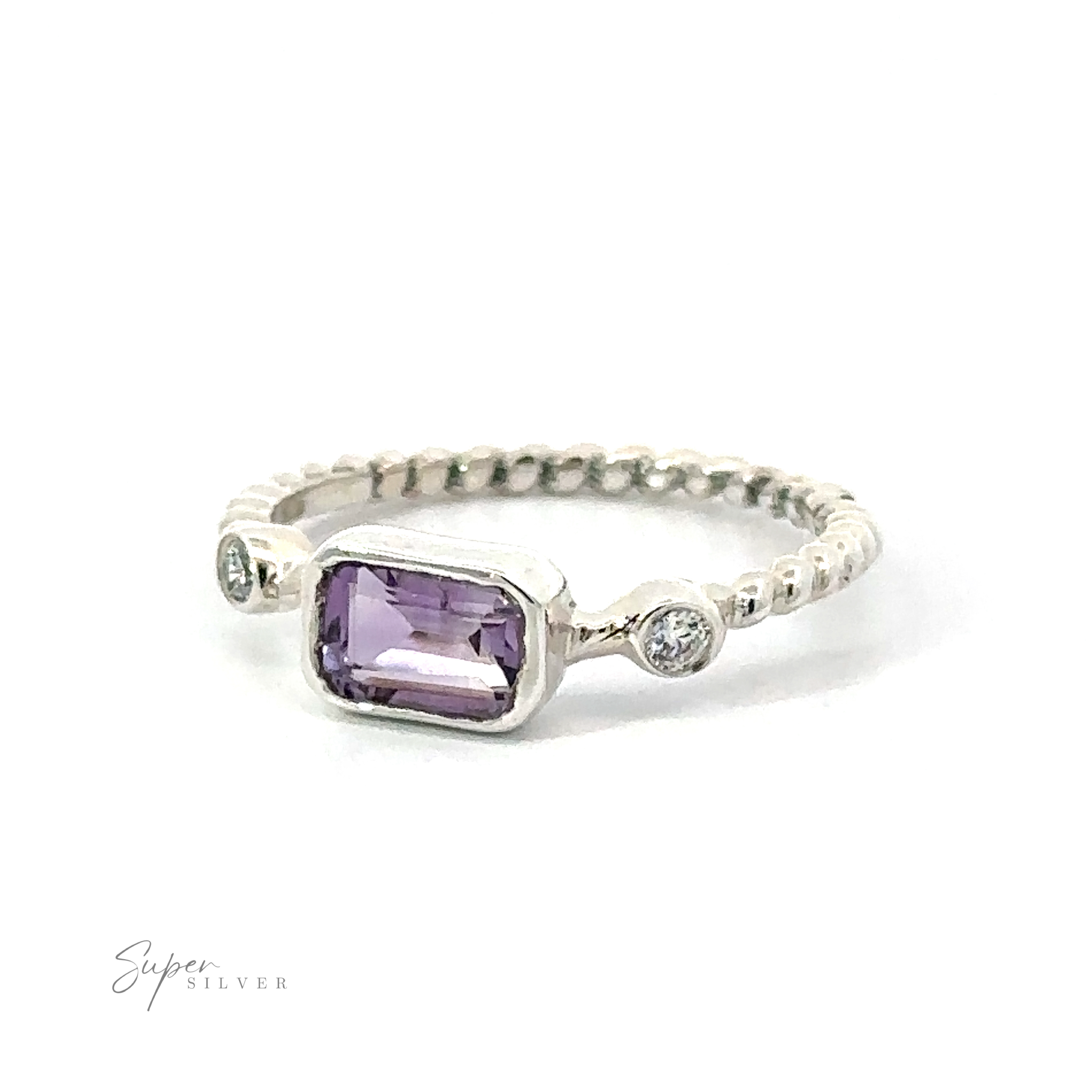 A silver Rectangle Gemstone Ring with Twisted Band featuring a central purple rectangular gemstone flanked by two small round diamonds, set on a textured band with vintage charm.