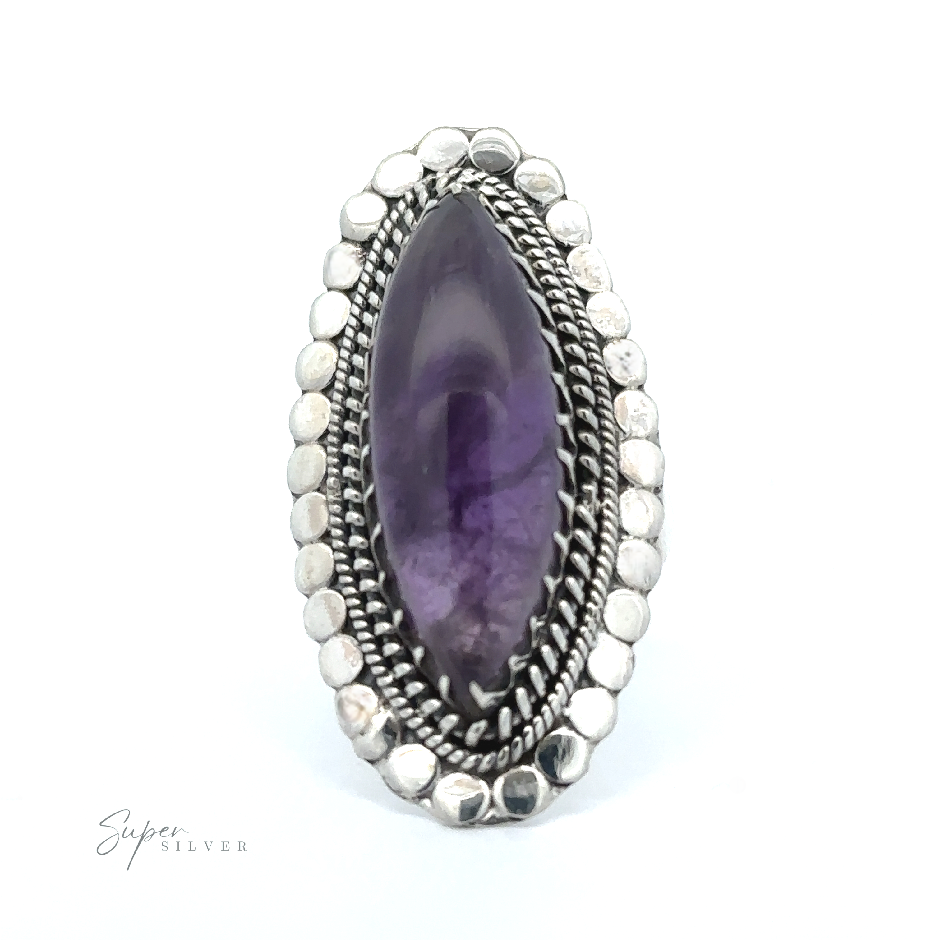 A silver ring with a large, elongated oval purple gemstone set in an intricately designed bezel, featuring rope detailing and a dotted border. Perfect for fans of Bohemian jewelry, it includes "Statement Marquise Shaped Gemstone Ring" text visible in the corner.