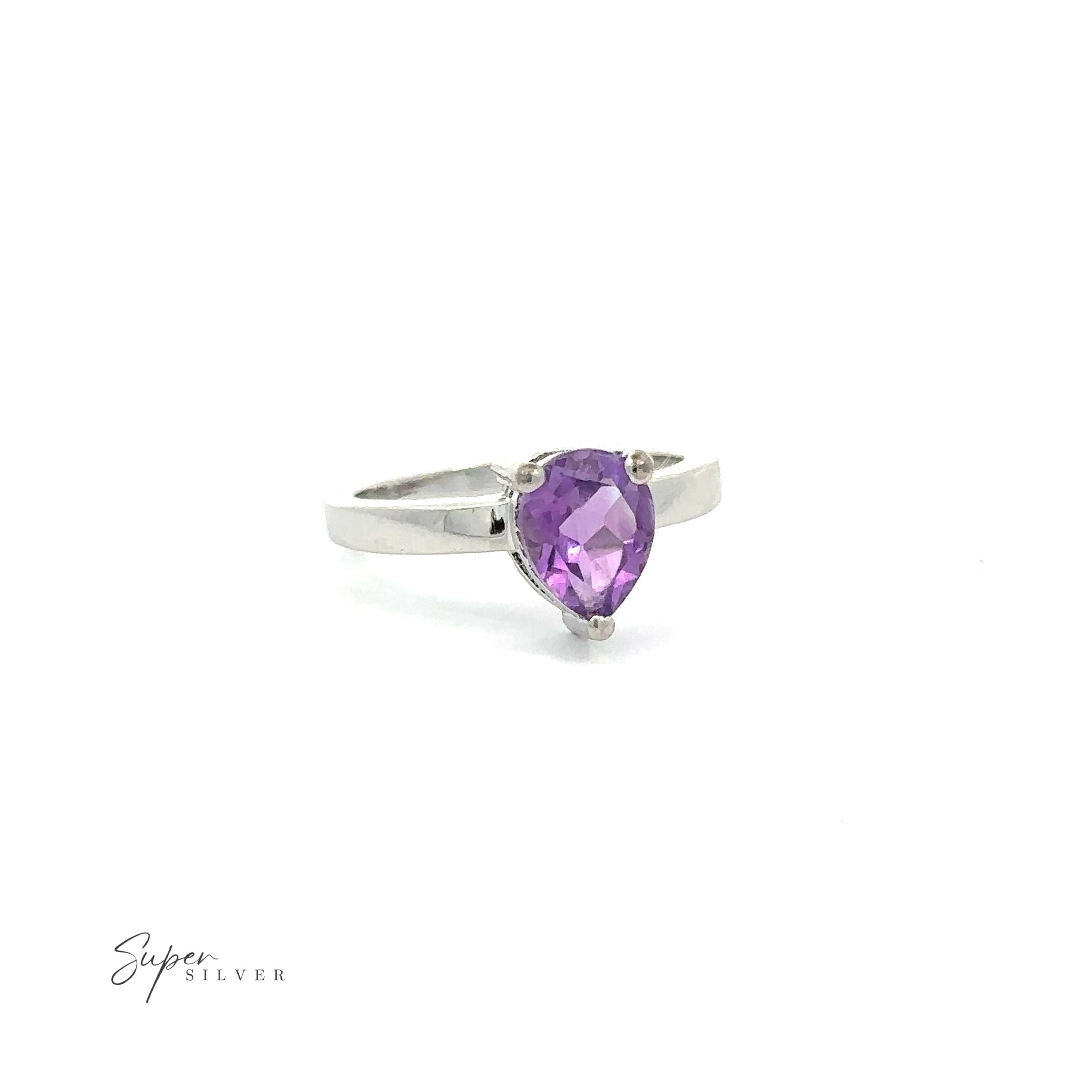 An Elegant Faceted Gemstone Jewelry Set with a pear shaped stone.