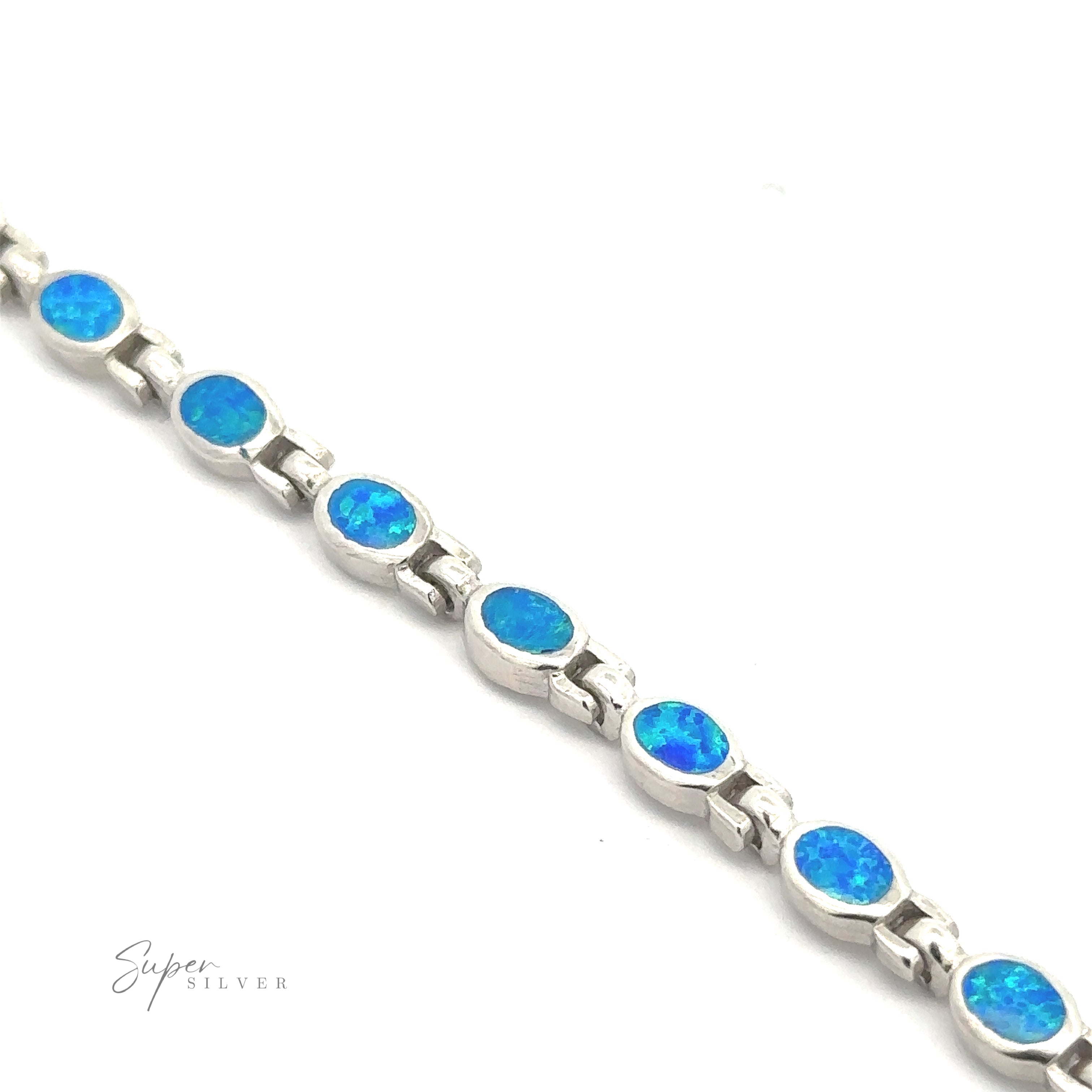 The "Oval Lab-Created Opal Bracelet" by Super Silver features a series of oval, lab-created blue opal stones set in individual links. The brand name is prominently displayed in the bottom-left corner, highlighting its modern design.