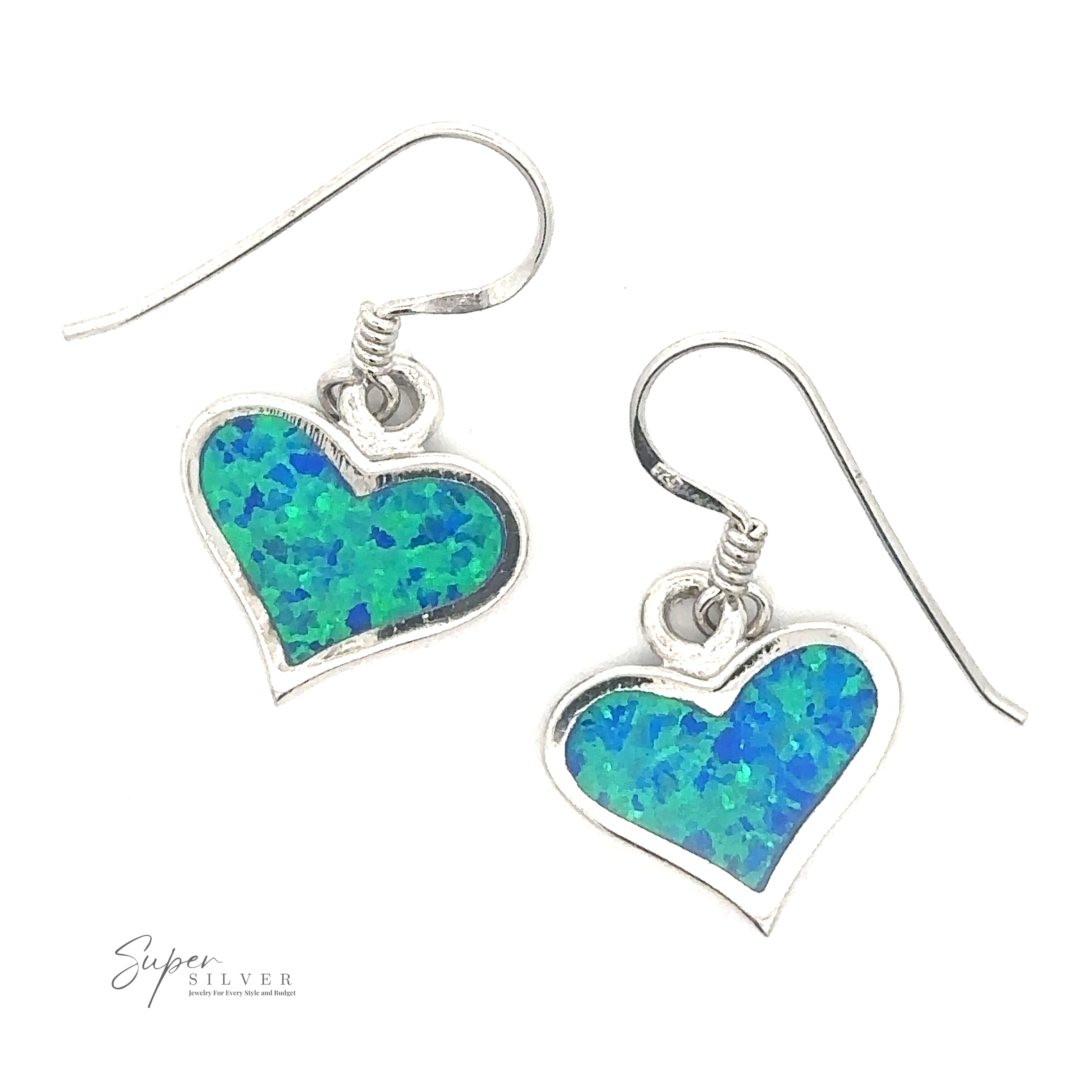 A pair of Lab-Created Opal Heart Earrings crafted from rhodium plated sterling silver, featuring a green and blue speckled inlay.