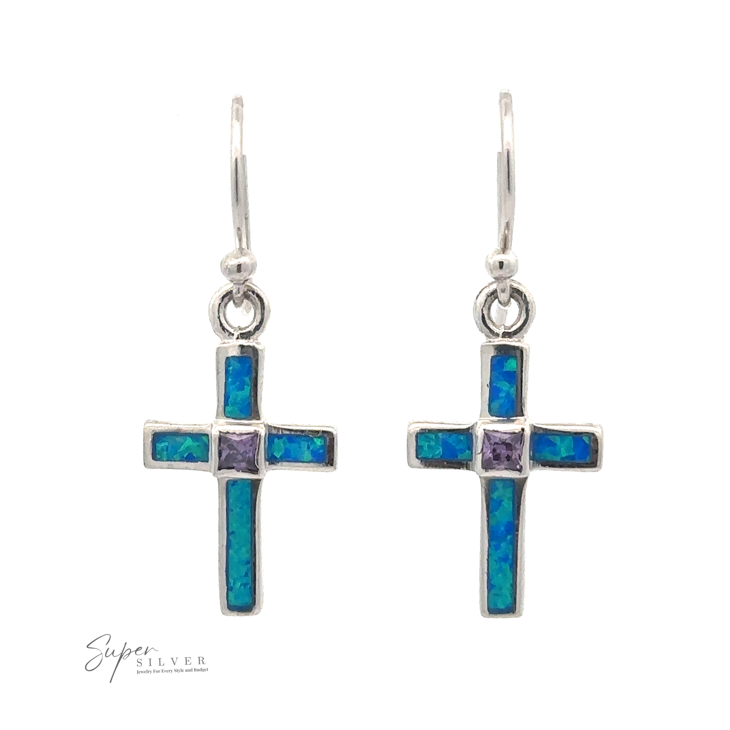 A pair of Blue Opal Cross Earrings With Amethyst Center Stone featuring blue and green inlaid stones with a small pink stone in the center, hanging from silver hooks. The brand "Super Silver" is visible in the bottom left corner.