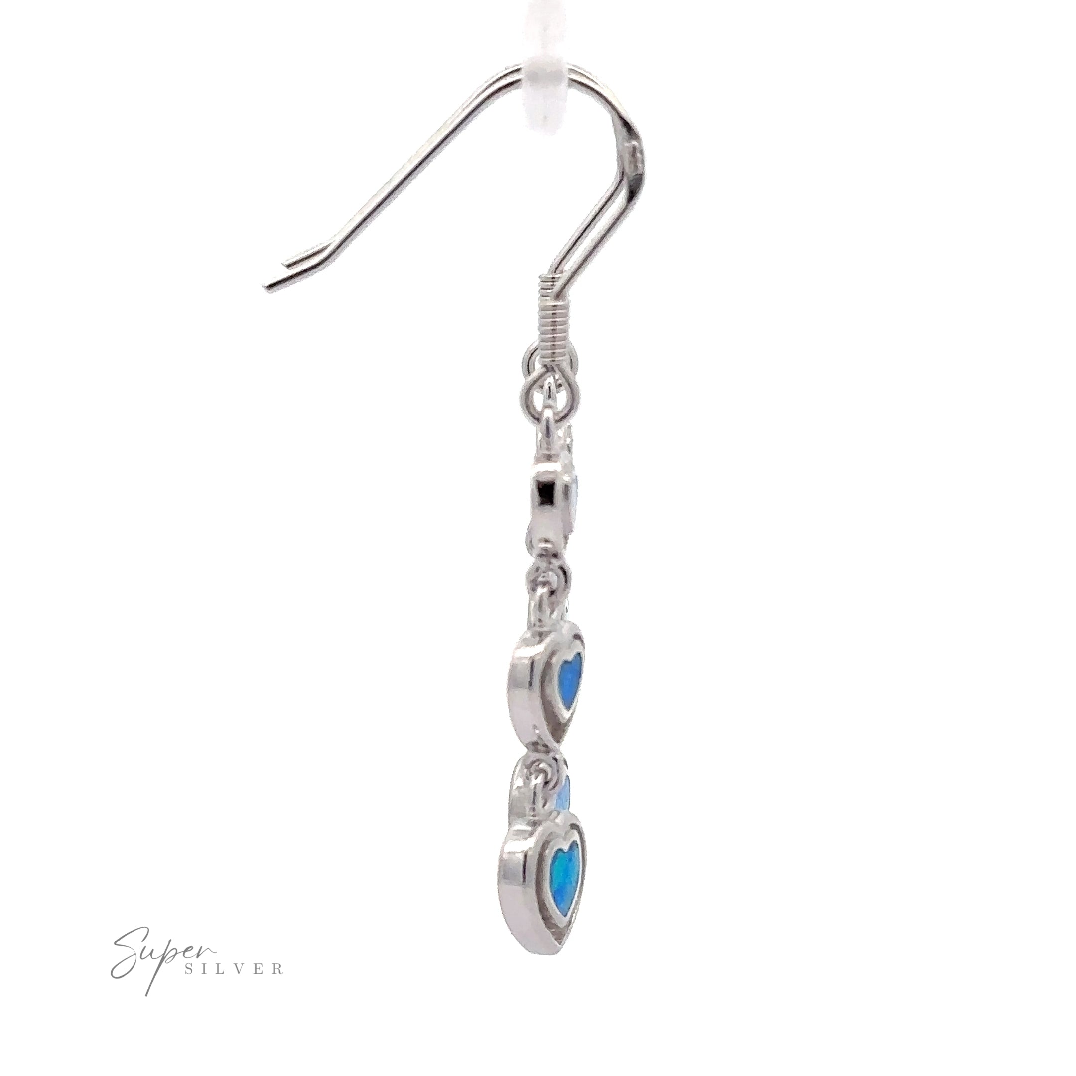 Dangling Lab-Created Opal Heart Earrings in sterling silver, featuring two heart-shaped opals, isolated on a white background. The logo at the bottom left reads "Super Silver.