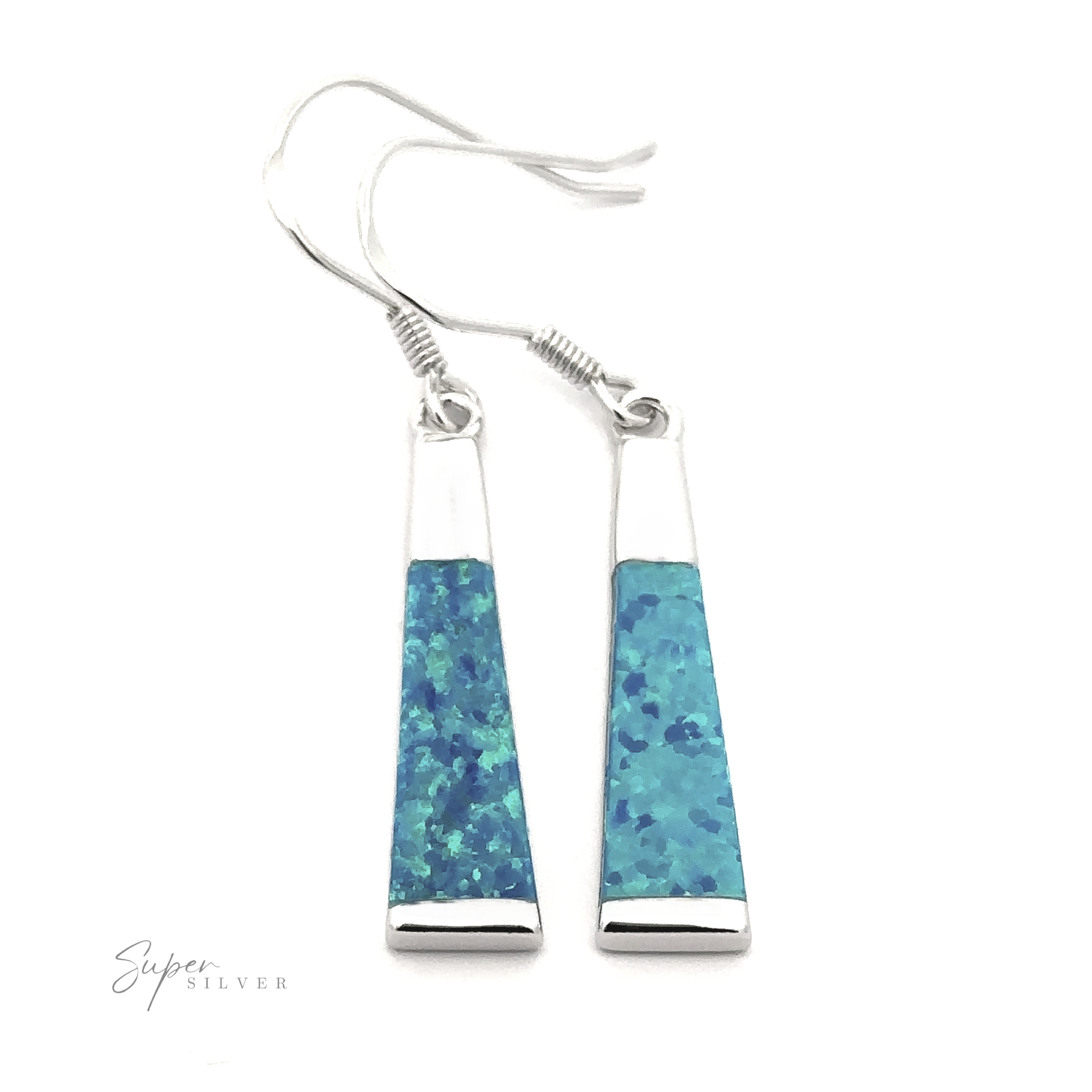 A pair of Elegant Long Opal Earrings featuring elongated, trapezoidal pendants with a blue-speckled pattern adds modern flair for the contemporary artsy woman. The brand name "Super Silver" is visible in the bottom left corner.