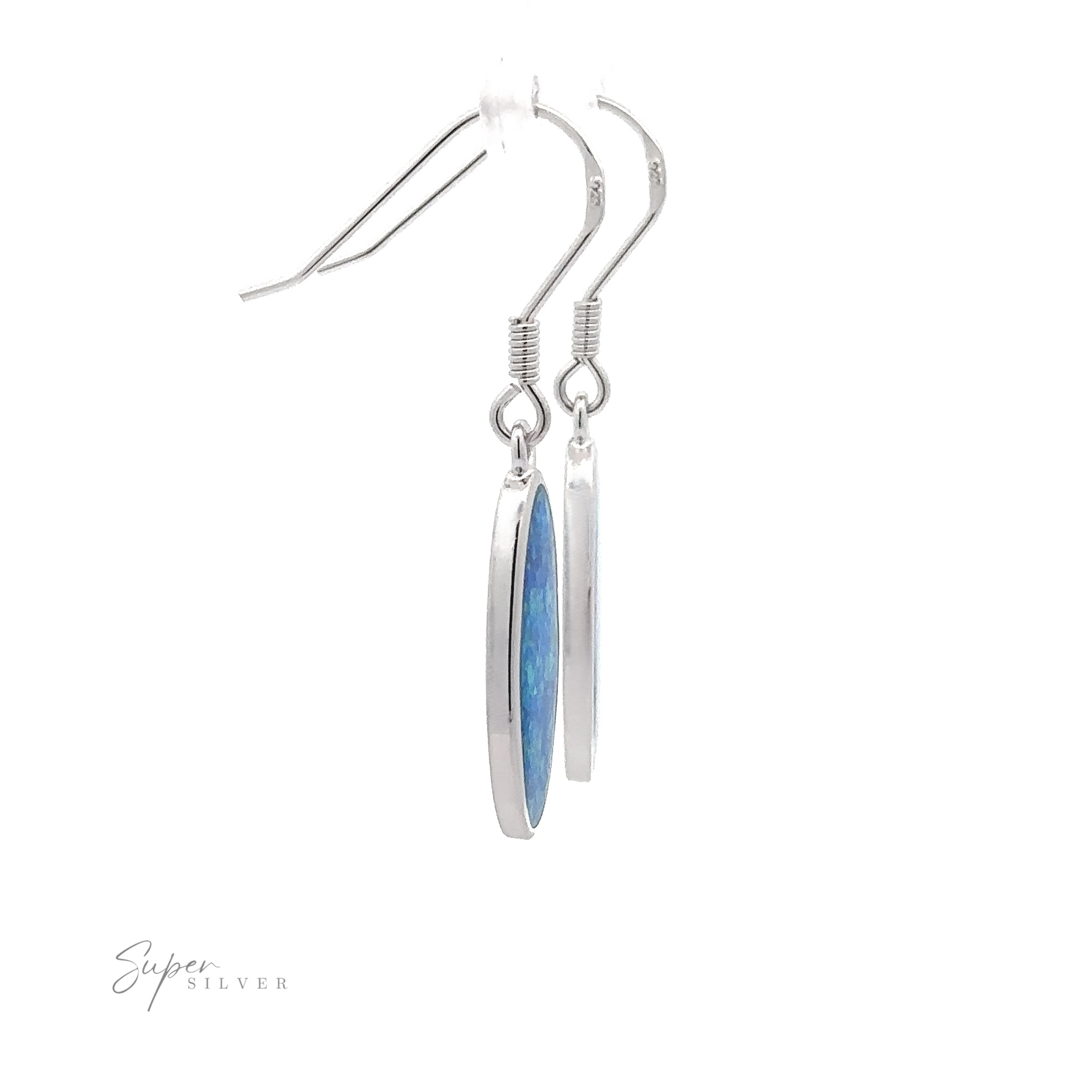 Close-up of a pair of Simple Oval Lab-Created Opal Earrings with silver dangles and oval blue opal gemstones, hanging from hooks. The logo "Super Silver" is visible in the bottom left corner.