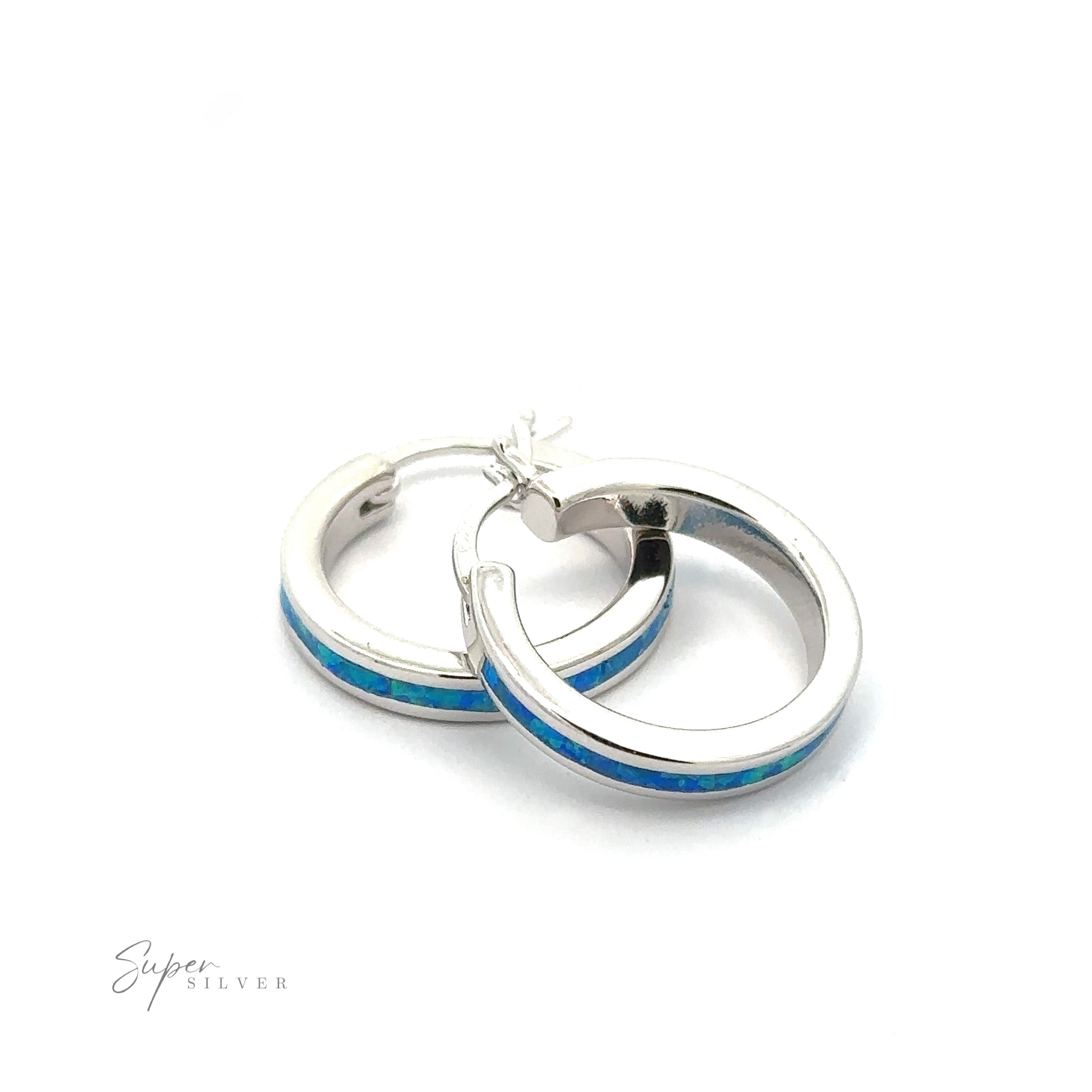 Two Blue Lab-Created Opal Hoop Earrings with a rhodium finish on a white background.