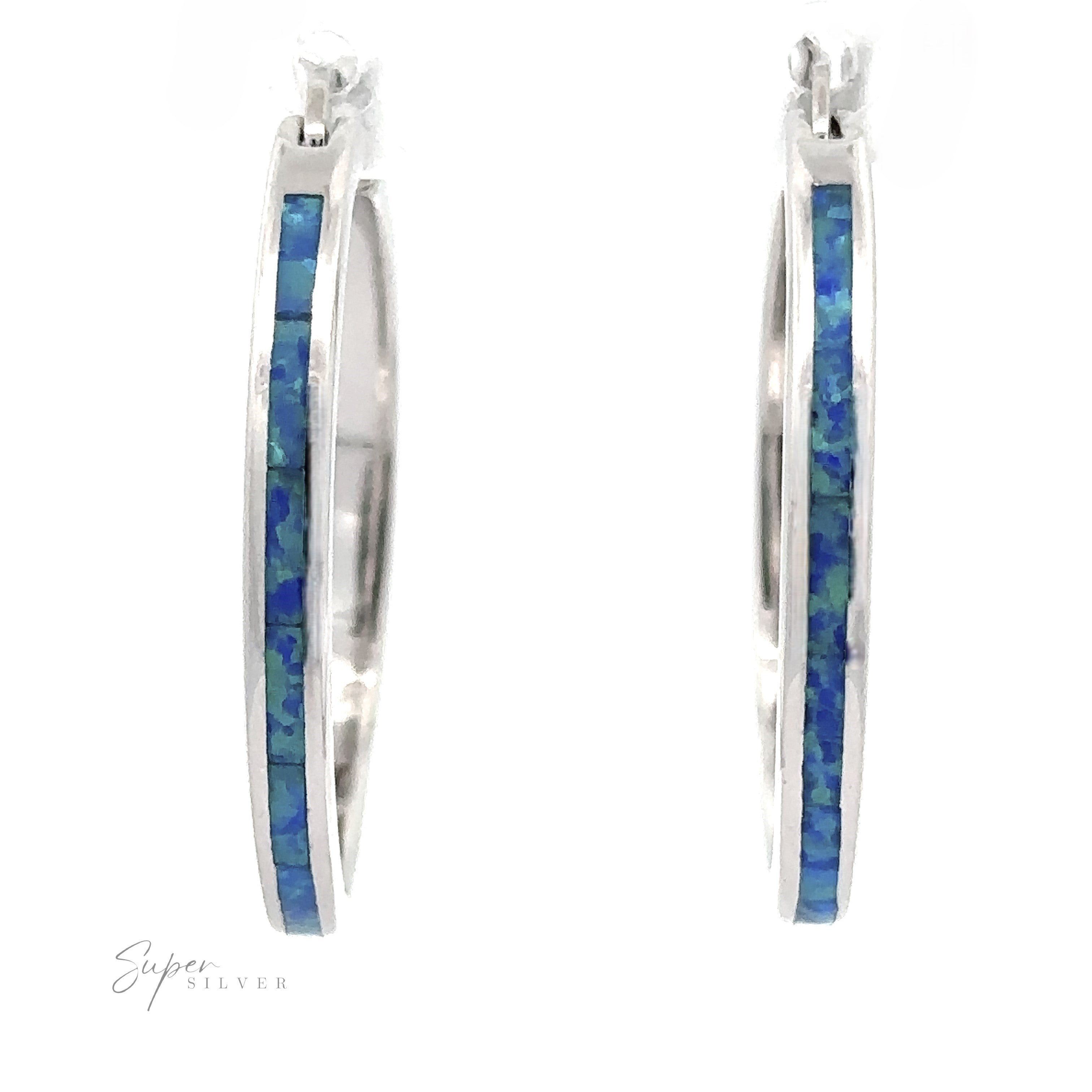 The Blue Lab-Created Opal Hoop Earrings are elegantly adorned with a mesmerizing blue lab-created opal inlay and enhanced with a sleek rhodium finish.