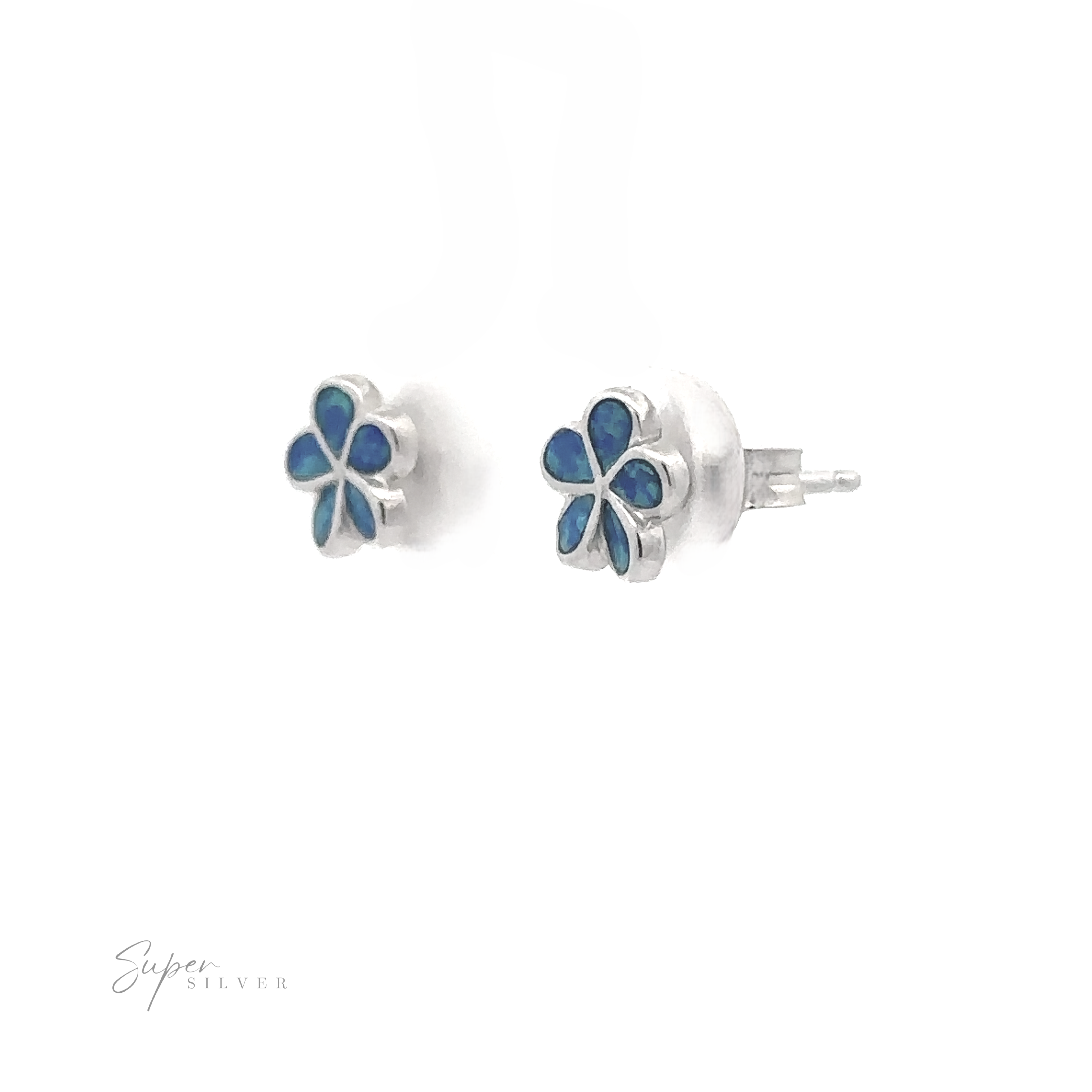 A pair of Small Plumeria Lab-Created Opal Stud Earrings, crafted in sterling silver with a flower design. The earrings feature blue lab-created opal inlays on a white background, with 'Super Silver' text in the lower left corner.