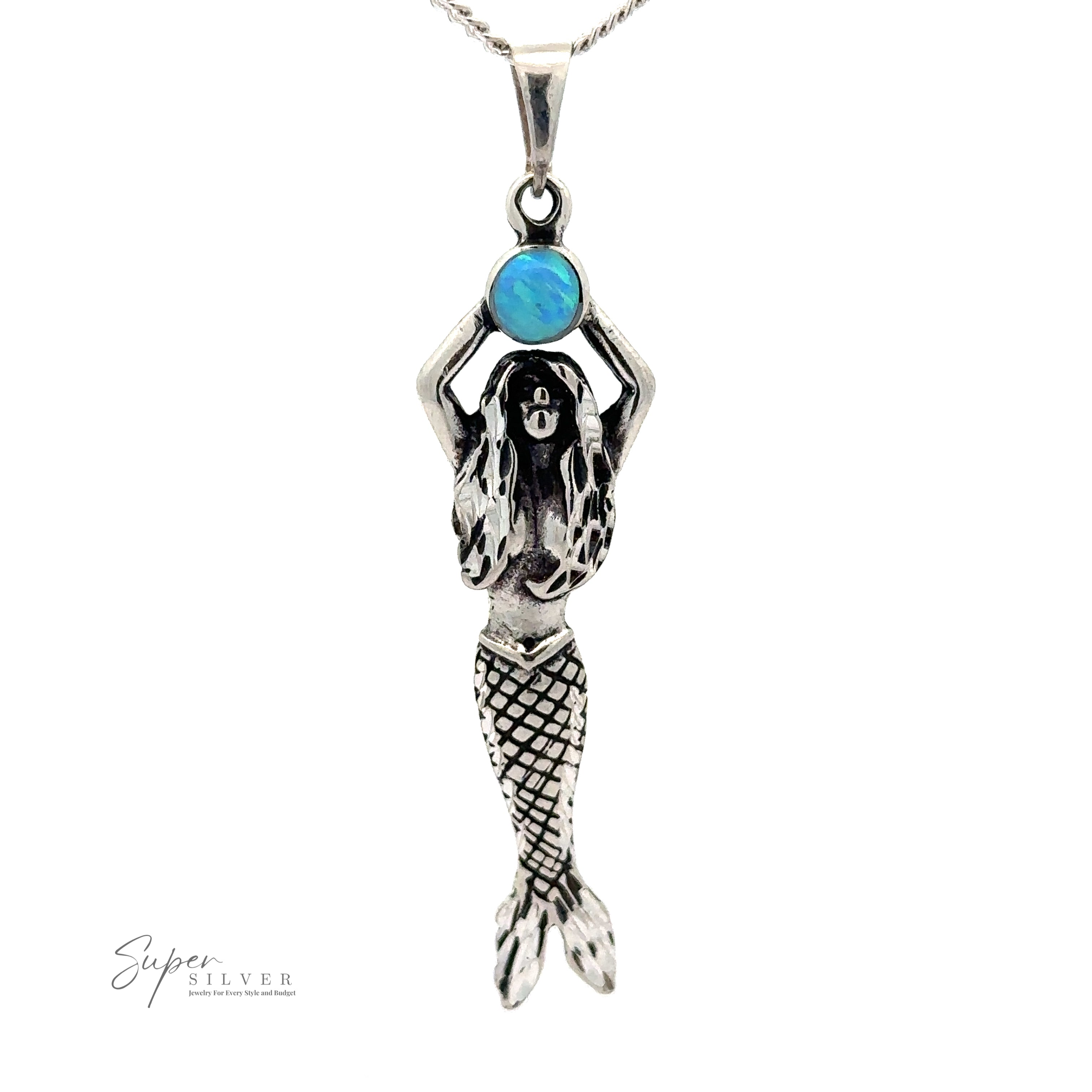 Mermaid And Opal Pendant with intricate details, holding a blue opal stone above her head. Text in the image reads "Super Silver".