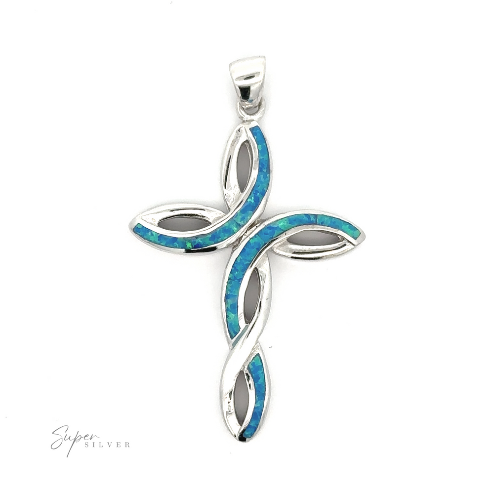 Opal Cross Pendant with a swirling design inlaid with blue opal accents on a white background.