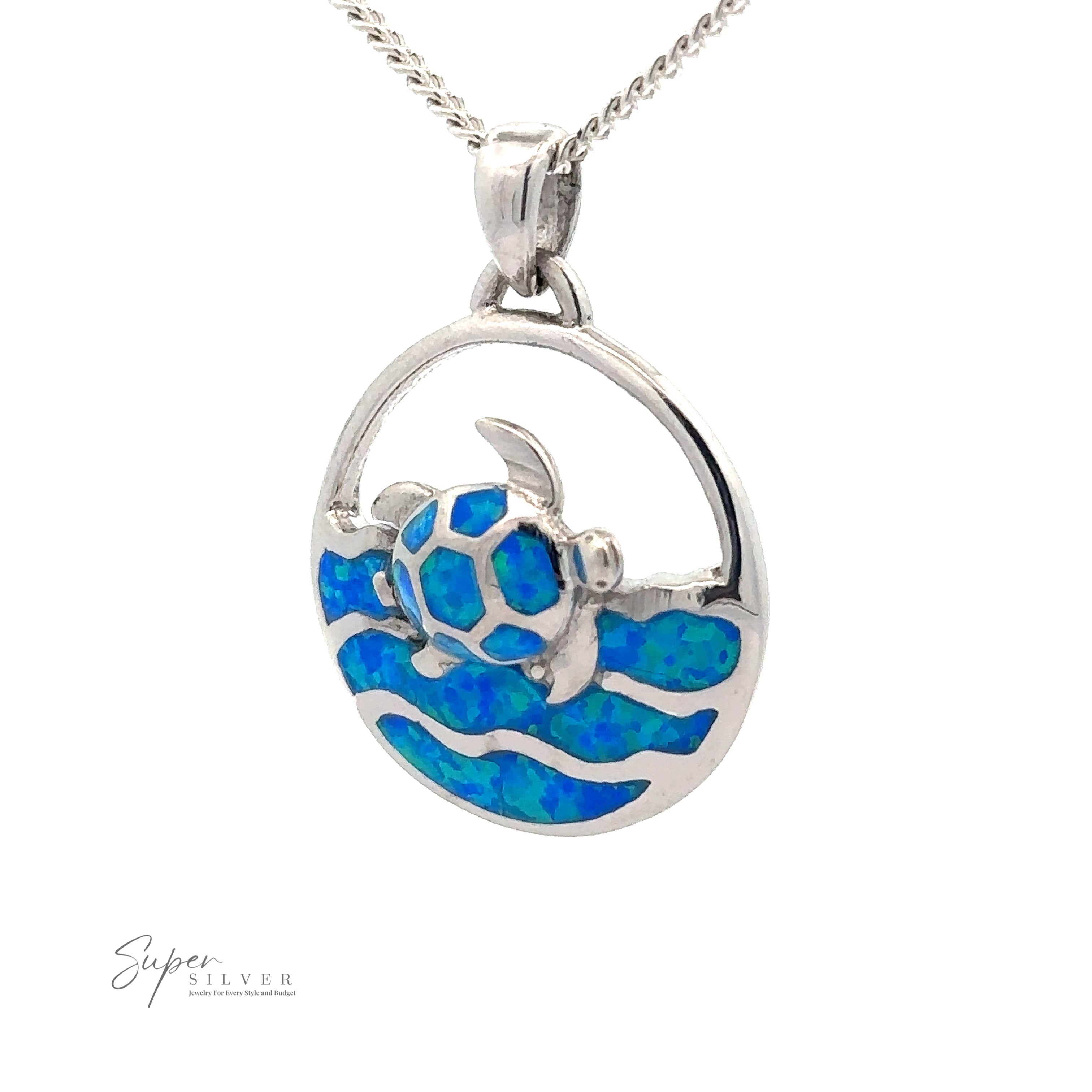 A Blue Opal Sea Turtle Pendant features a blue sea turtle on a wave motif, enclosed in a circular frame. The brand "Super Silver" is seen in the bottom left corner.