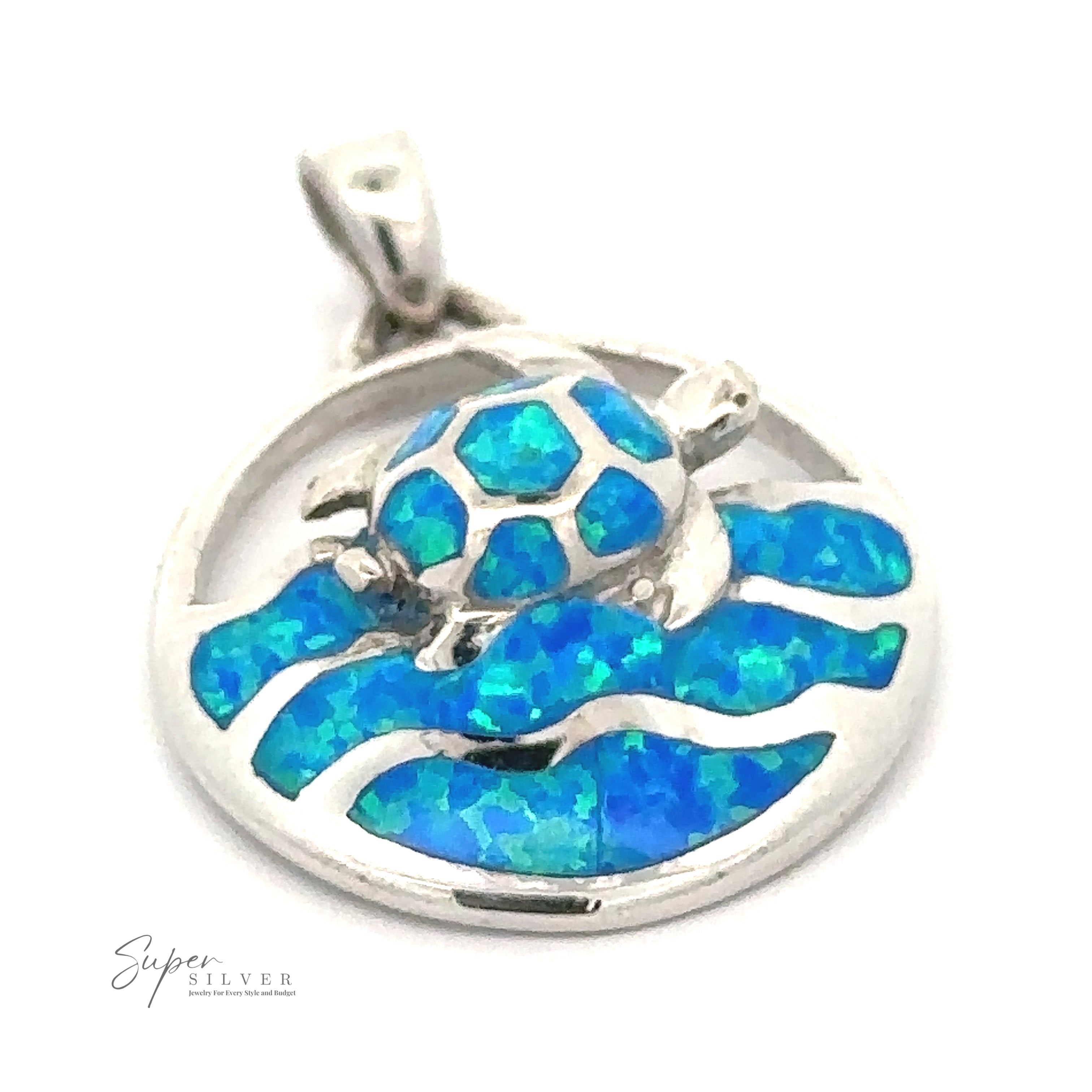 A Blue Opal Sea Turtle Pendant featuring a sea turtle with blue opal inlays on its shell and water waves. "Super Silver" is inscribed on the bottom left, making it a perfect piece of oceanic jewelry.