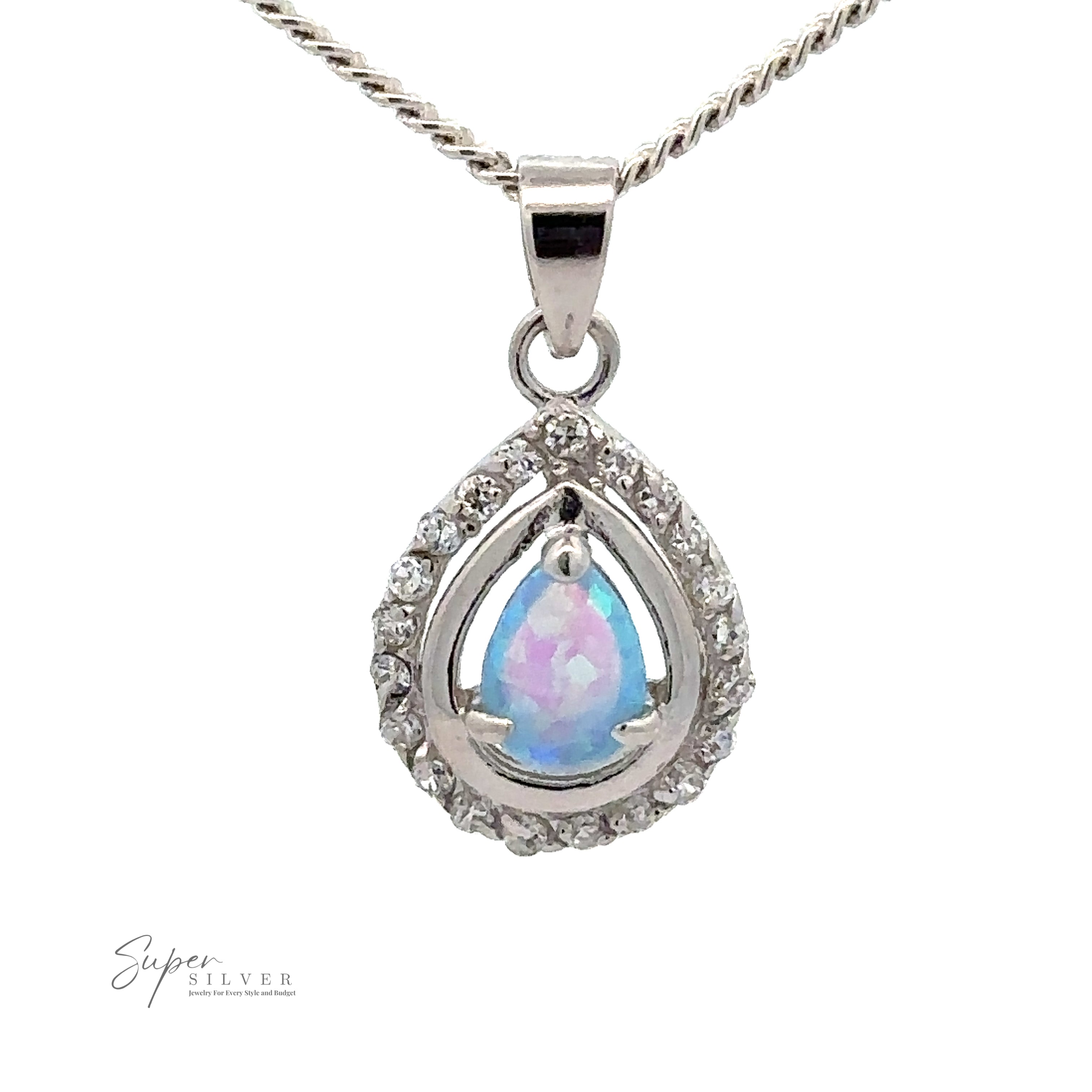A silver necklace with a teardrop-shaped pendant featuring an iridescent, lab-created opal stone surrounded by small clear crystals, reflecting the elegance of Opal Pendants with Cubic Zirconia.