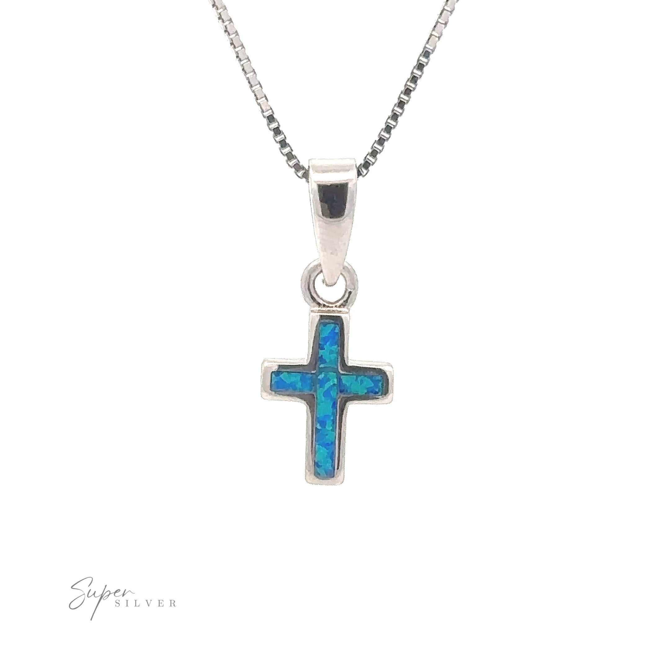 A sterling silver necklace featuring a captivating blue-green lab-created opal inlay in its minimalist cross pendant, known as the Lab-Created Opal Cross Pendants.