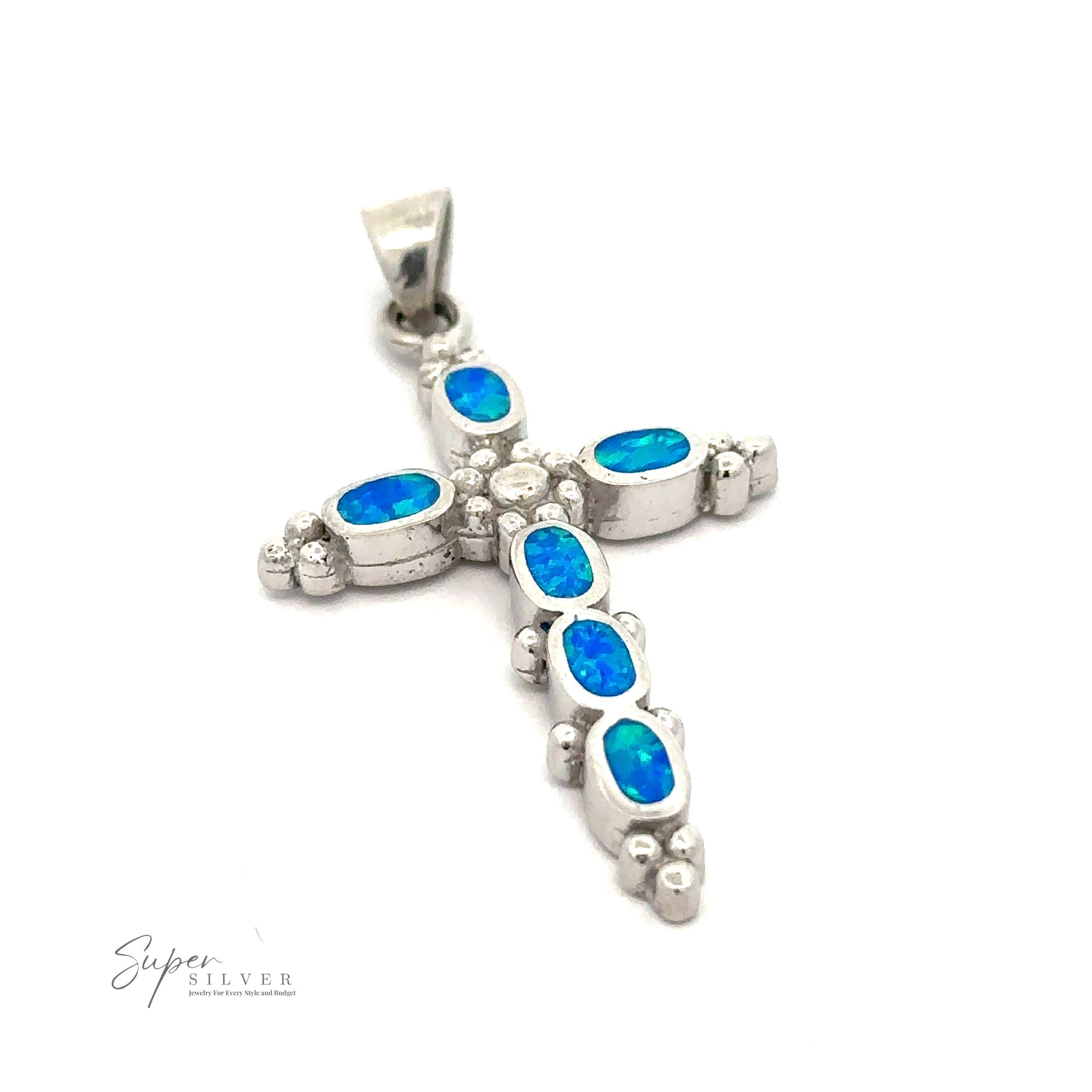 A Blue Opal Cross Pendant With Oval Stones adorned with blue opal inlays.