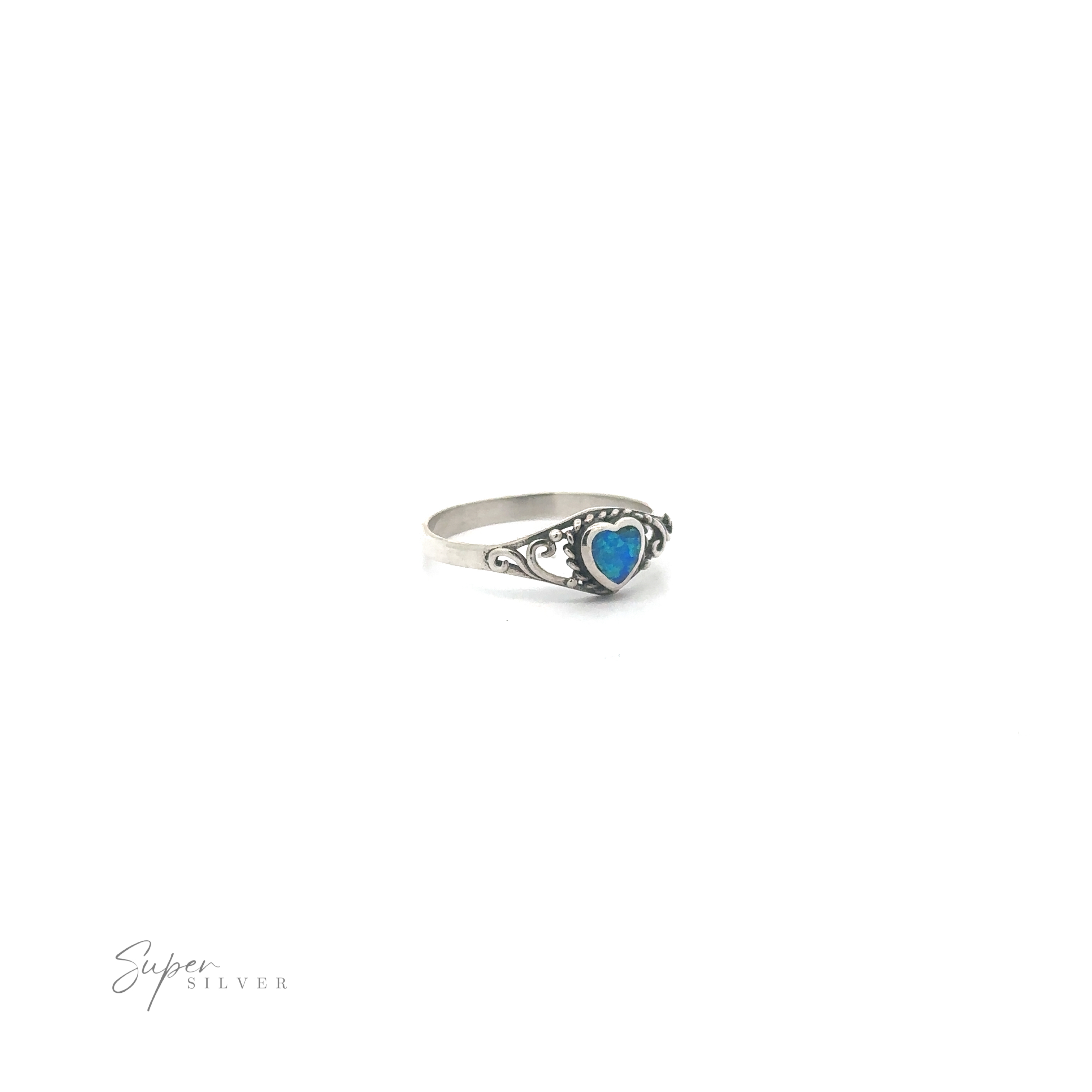 Dainty Blue Opal Heart Ring displayed on a white background.