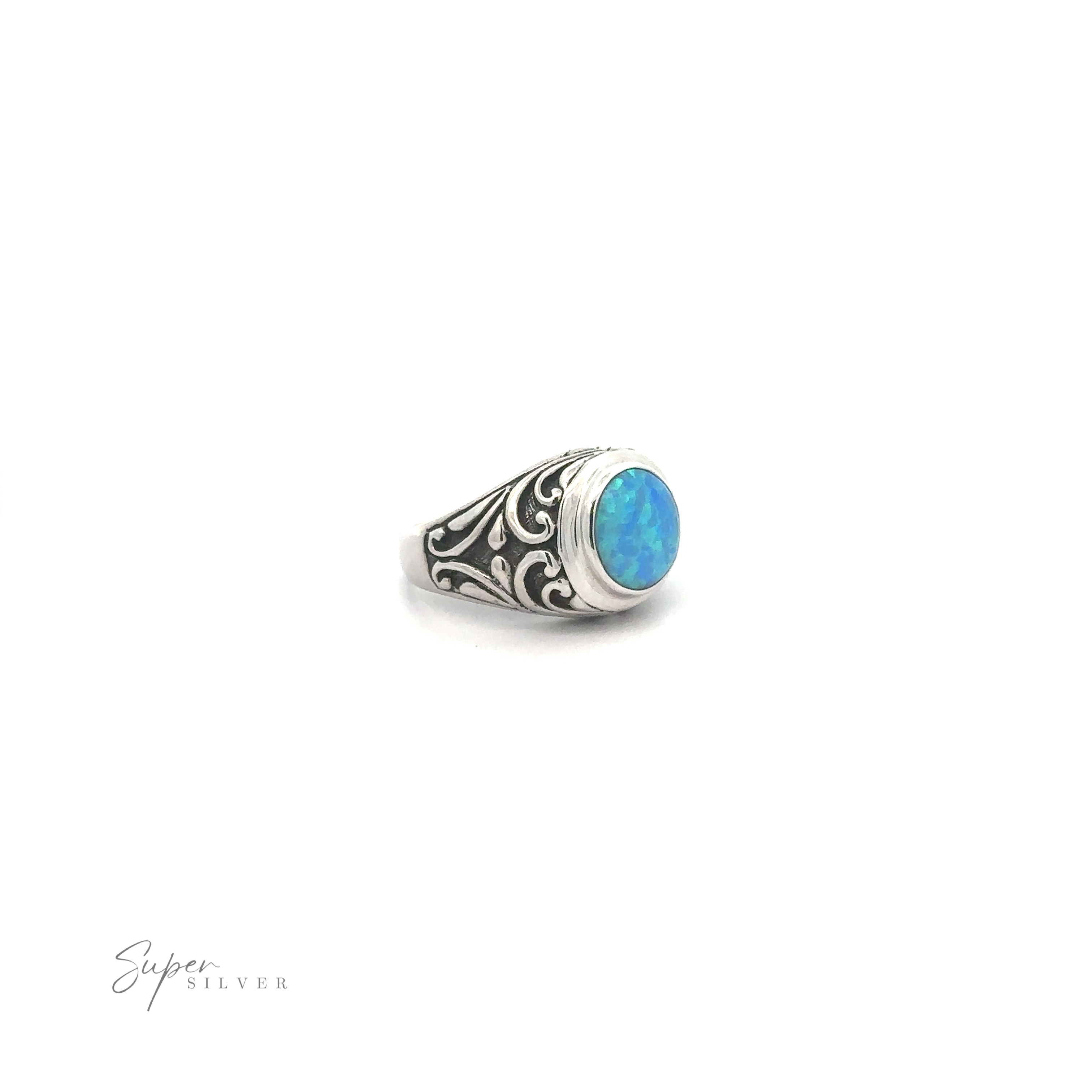 A sterling silver ring with an intricate Bali filigree design featuring a Opal Signet Ring with Bali Design gemstone.