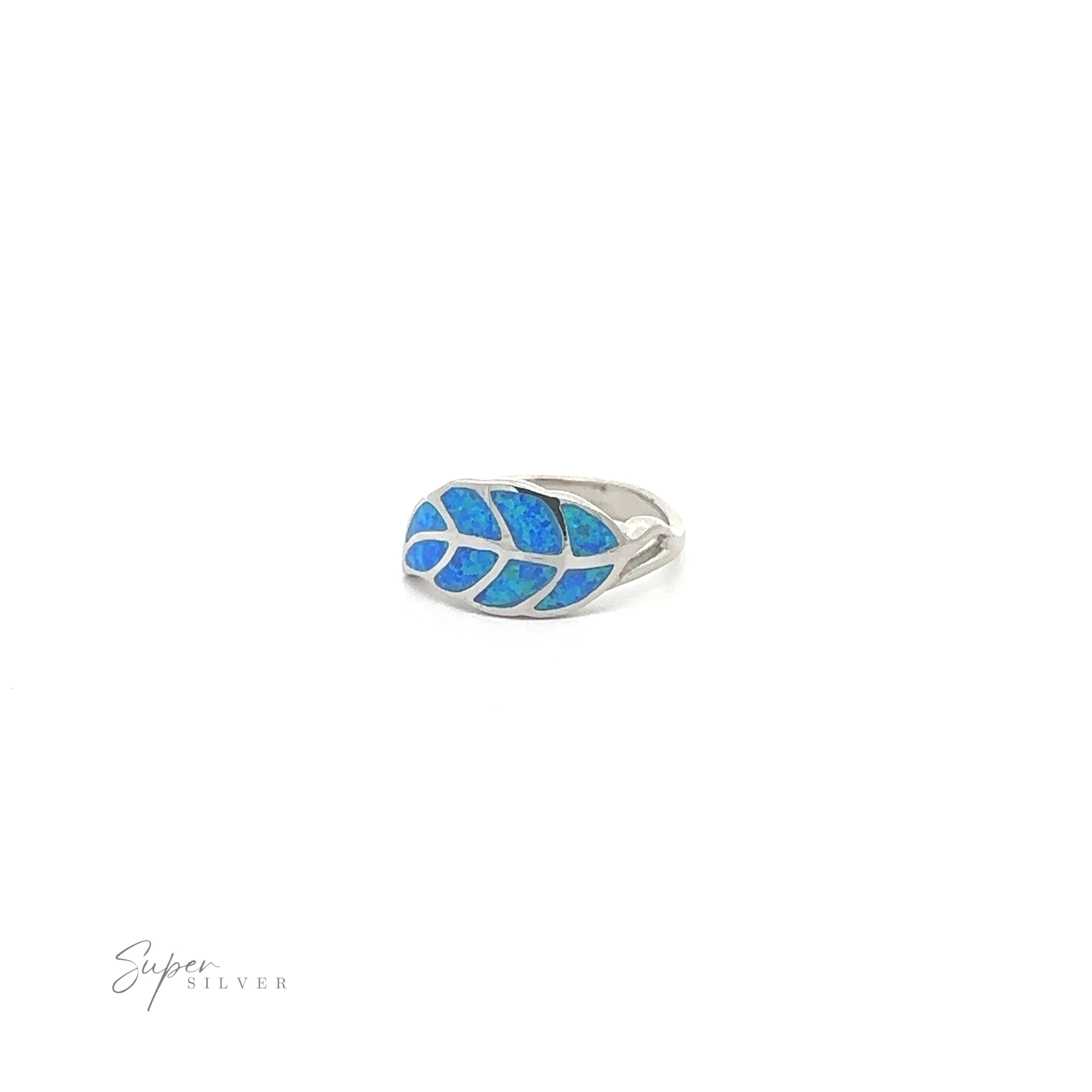 Lab Opal Feather Ring with ethereal blue inlay on a white background.