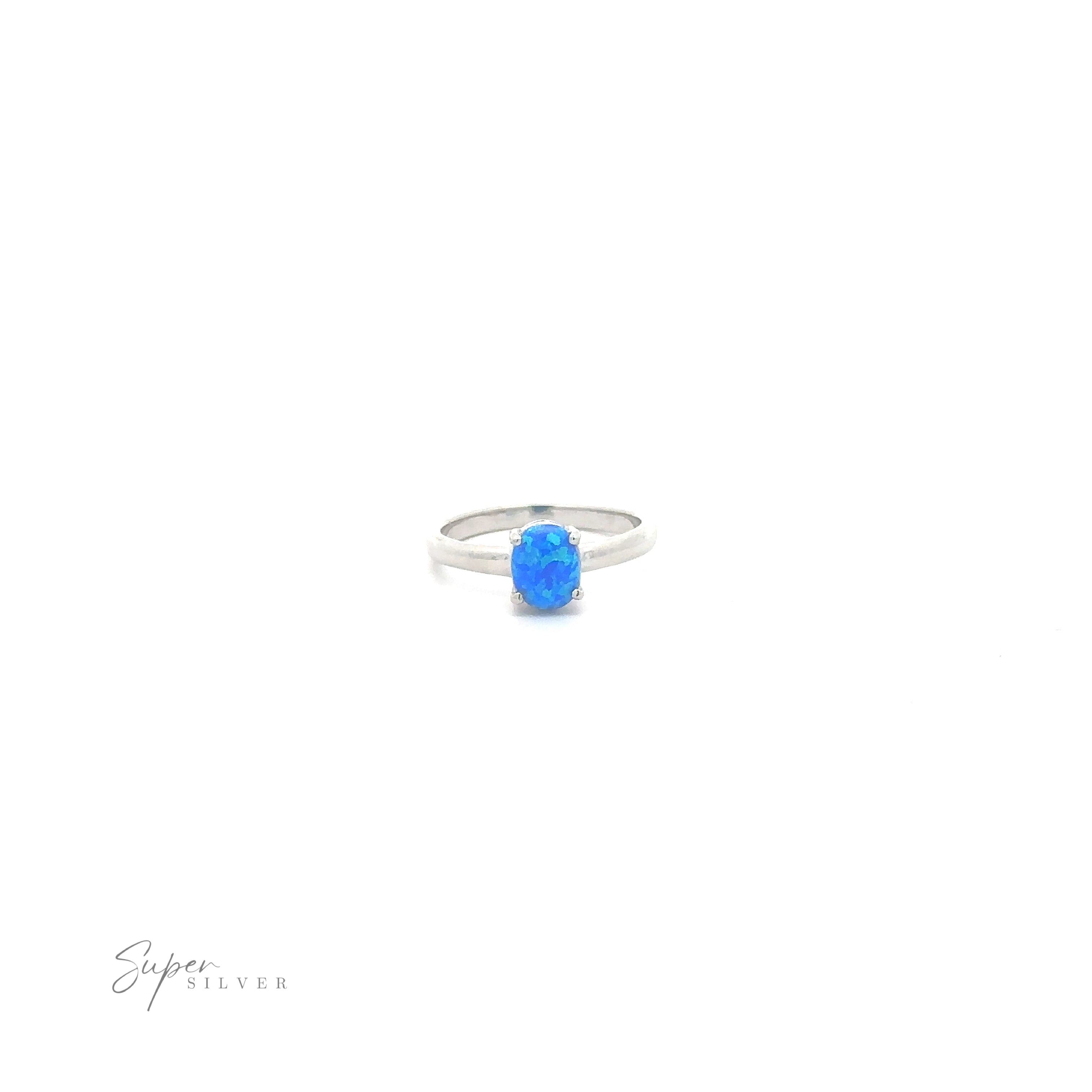 Simple Pronged Lab Opal Ring with a white background.