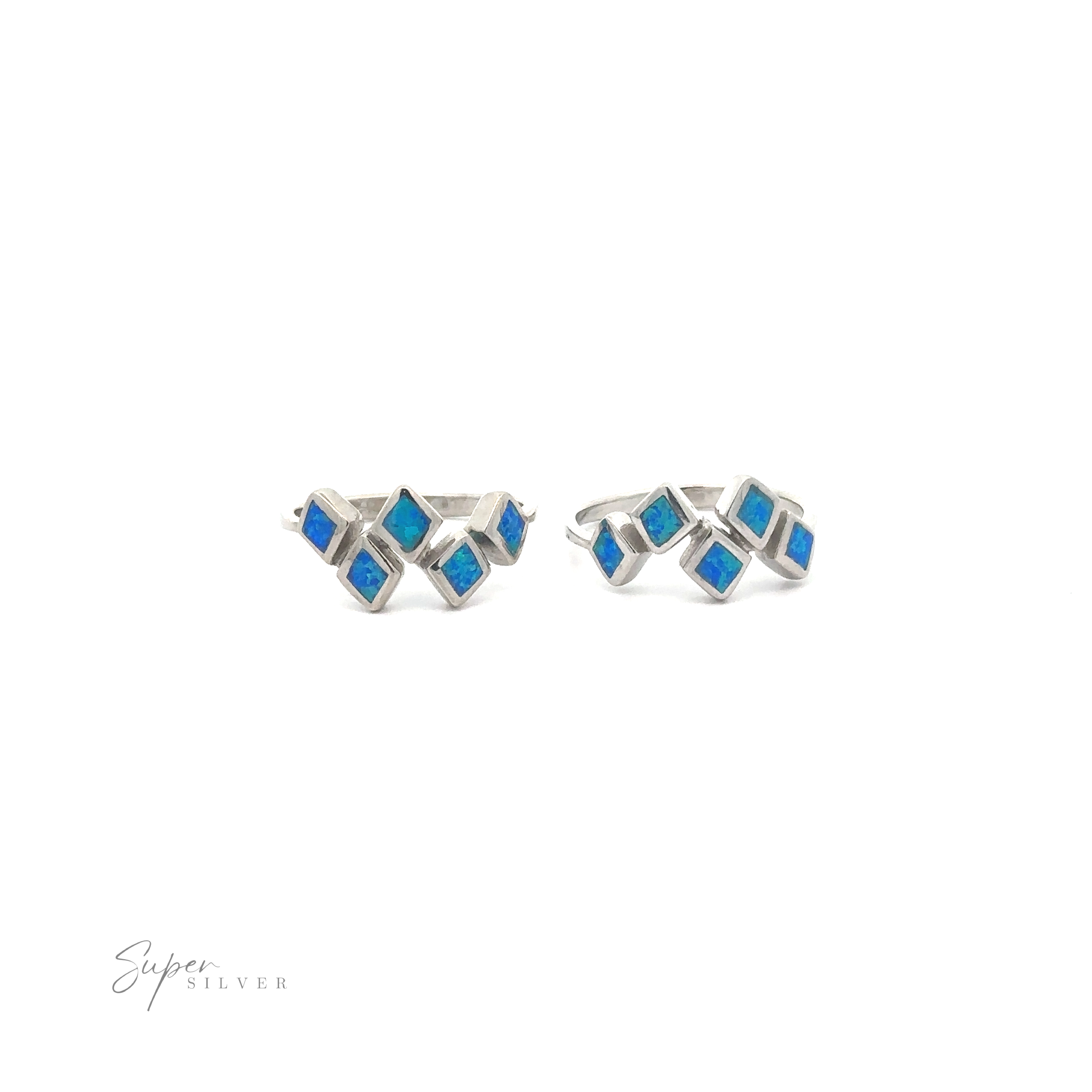 Pair of sterling silver earrings with blue gemstone accents in a geometric design, isolated on a white background.