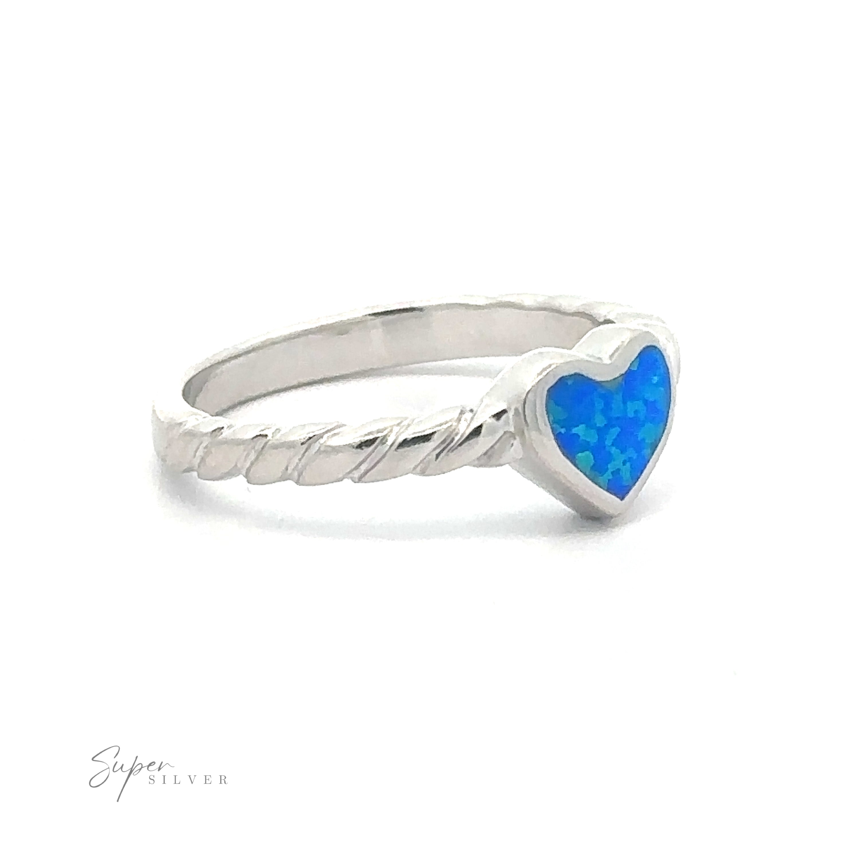 A sterling silver ring with a heart-shaped Lab Opal gemstone and a twisted band design.
