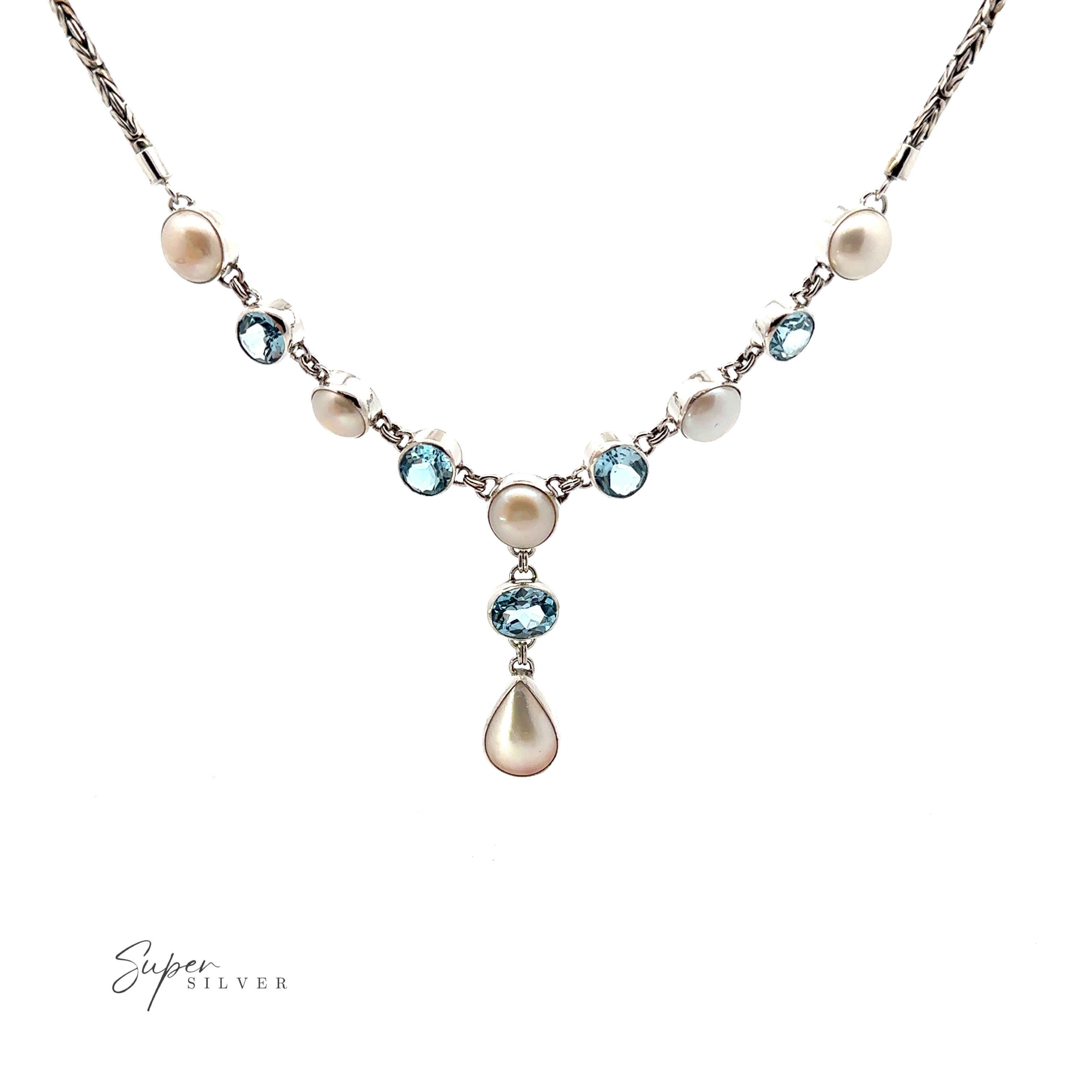 A Stunning Pearl and Gemstone Statement Necklace featuring a combination of pearlescent and blue gemstones, with an elegant teardrop-shaped pearl pendant at the center. Crafted from Sterling Silver, the brand "Super Silver" is displayed in the lower left corner.