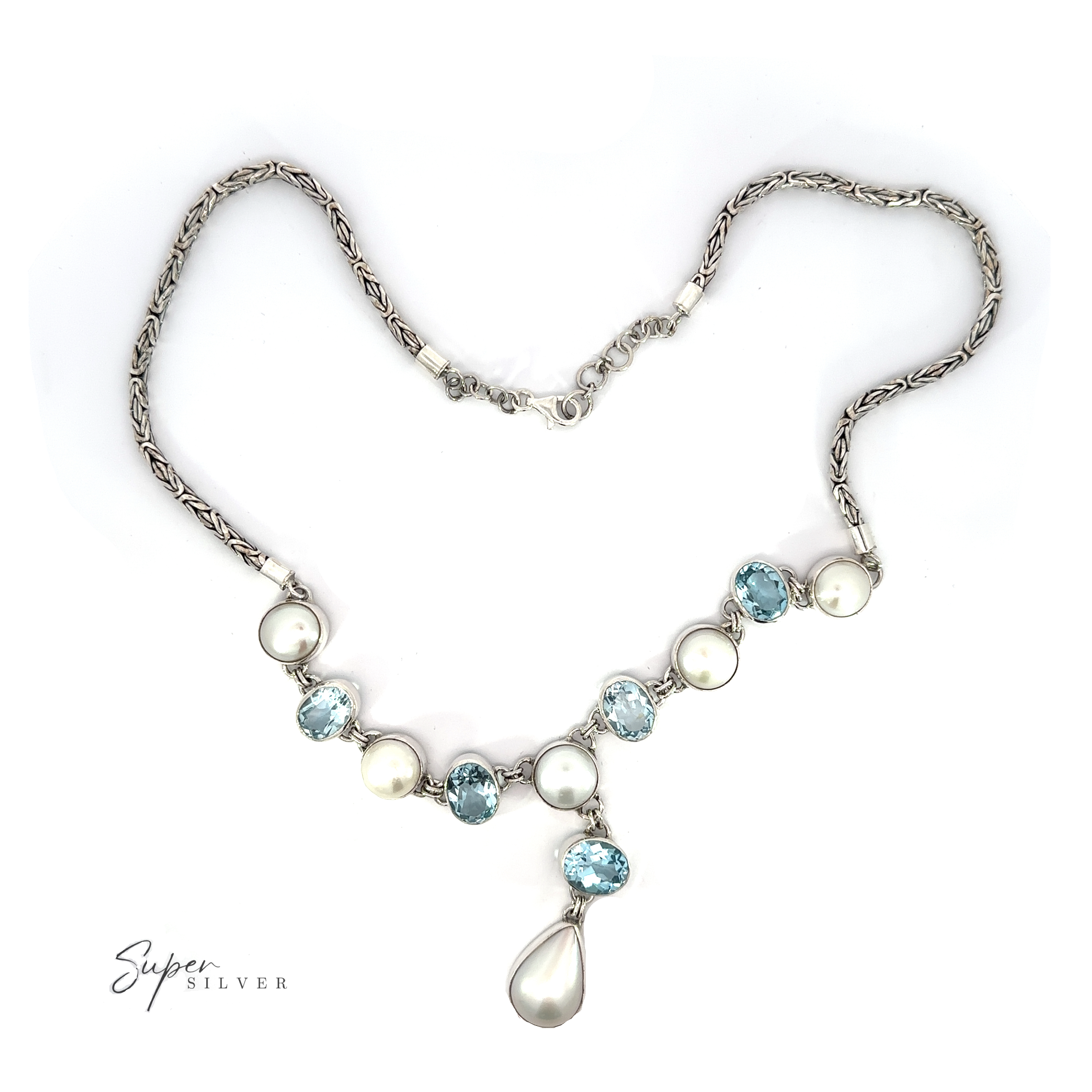 A Stunning Pearl and Gemstone Statement Necklace featuring a combination of gemstones and pearls with a single pearl drop pendant, displayed on a white background. The brand "Super Silver" is visible in the bottom corner.